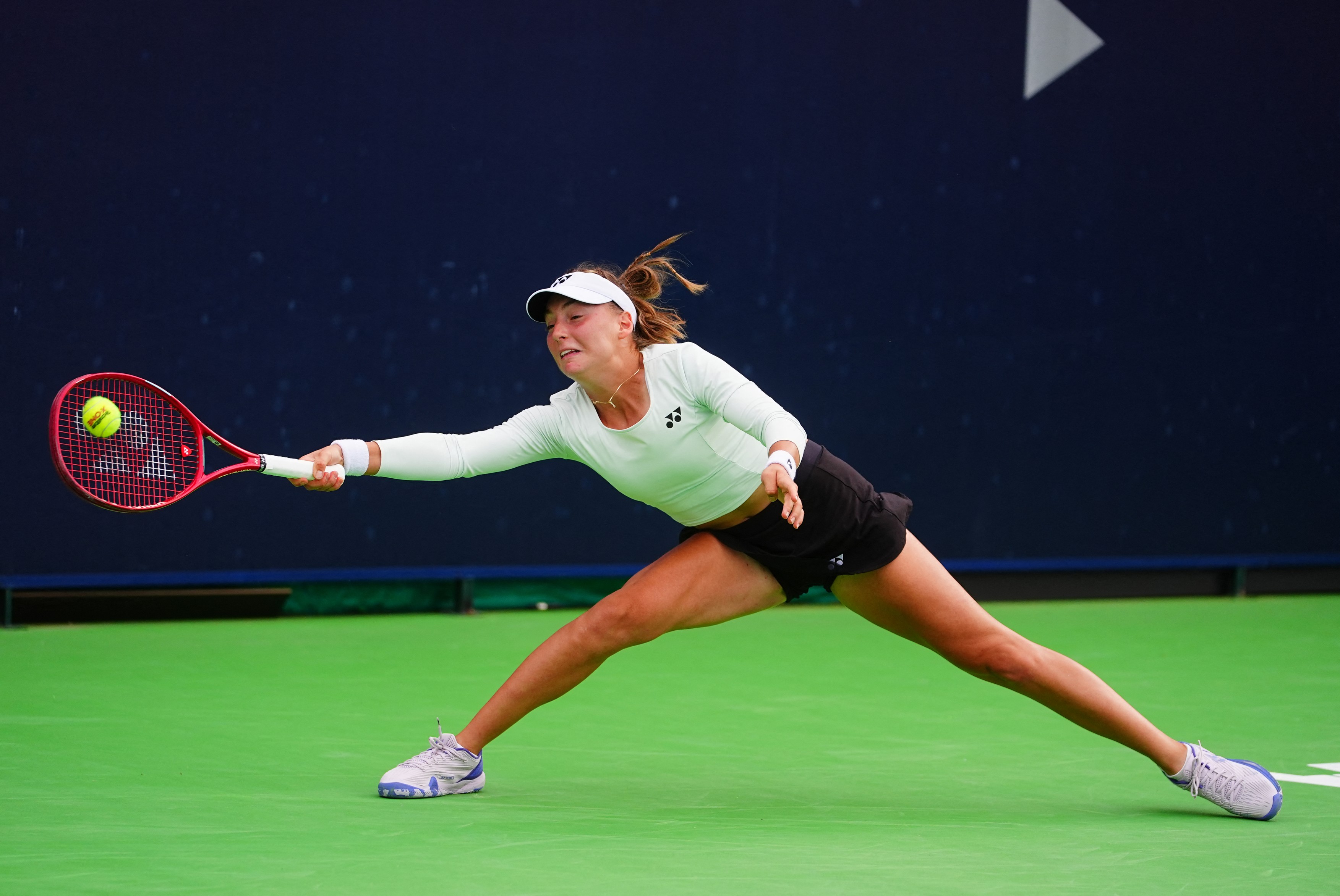 Teodora Kostovic of Serbia returns a shot against her Turkish opponent Berfu Cengiz