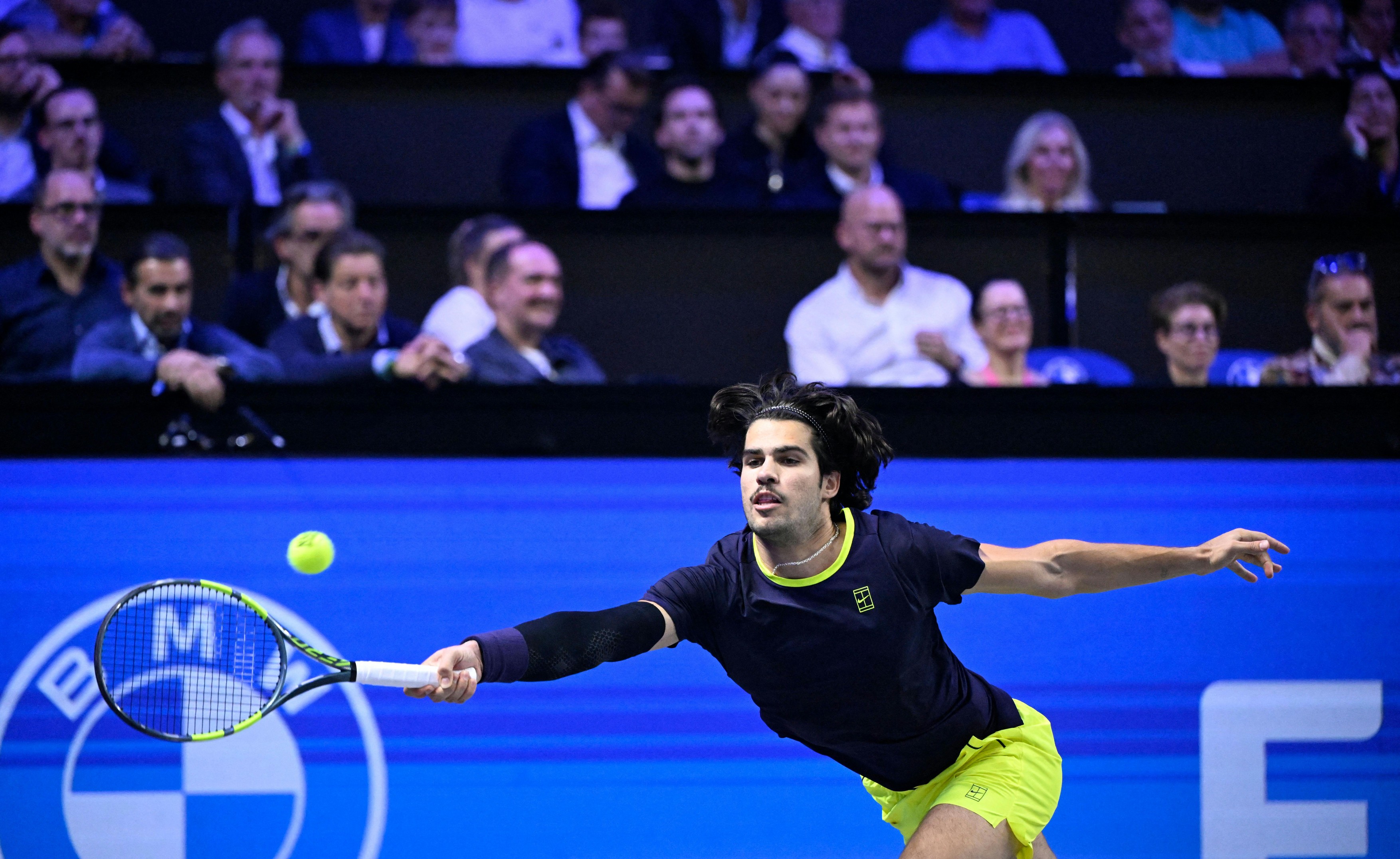 Spain’s Carlos Alcaraz returns the ball to Georgia's Nikoloz Basilashvili (not pictured)