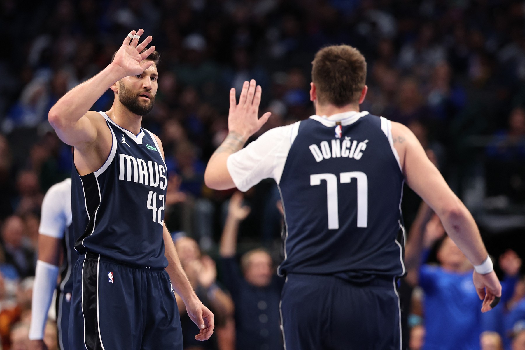 DALLAS, TEXAS - NOVEMBER 19: Maxi Kleber #42 and Luka Doncic #77 o