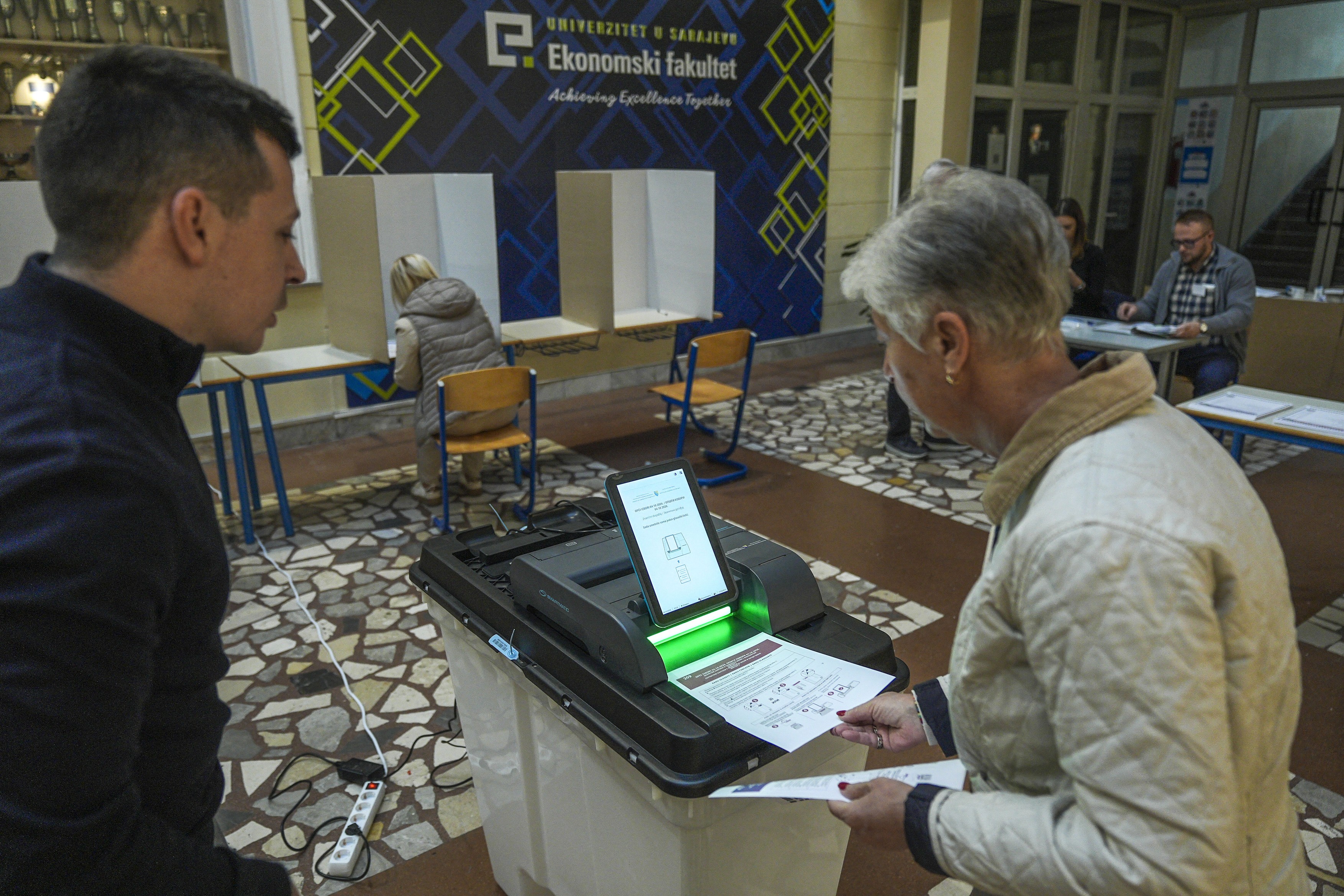 SARAJEVO, BOSNIA AND HERZEGOVINA - OCTOBER 04: Voters cast their ballots