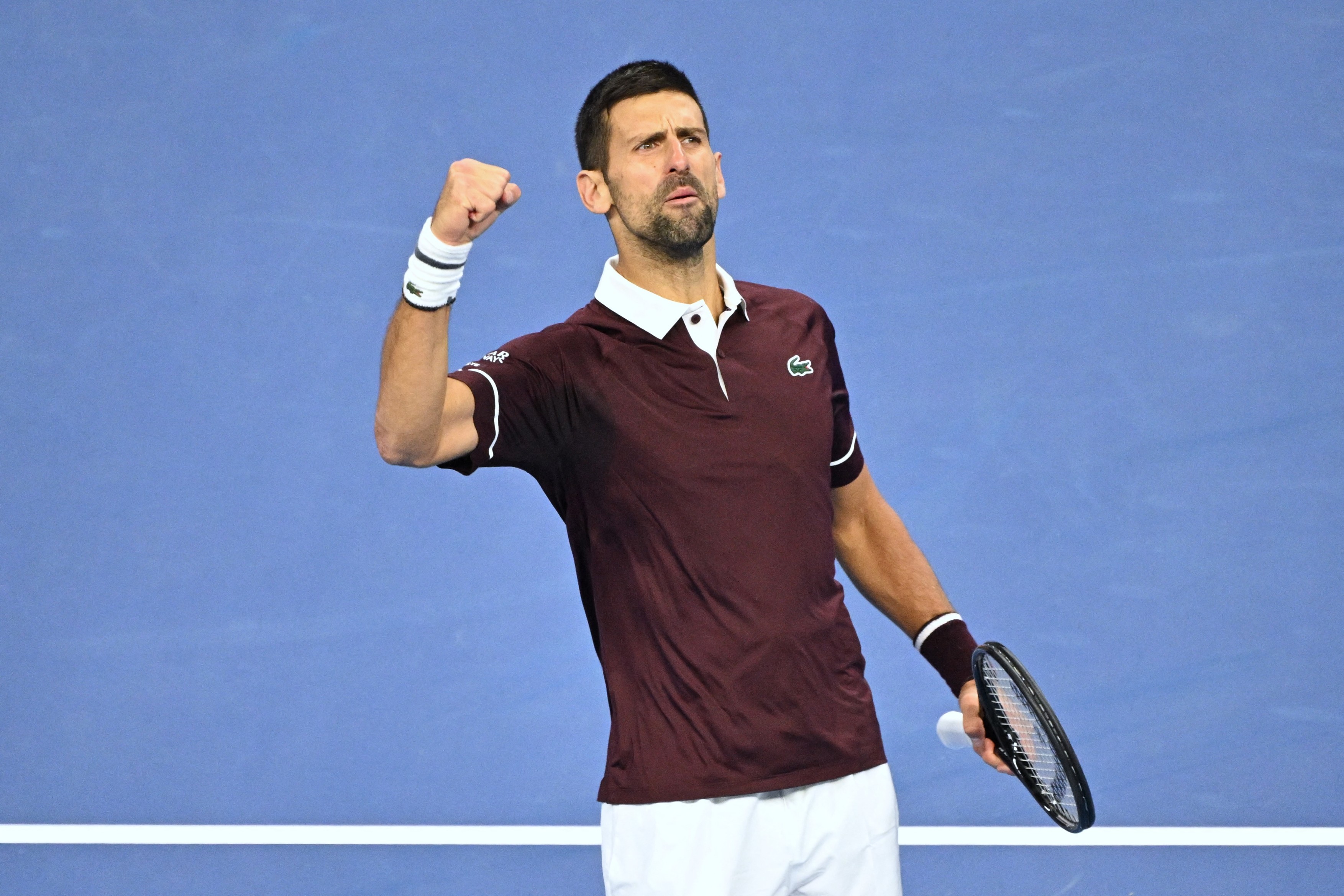 Serbia’s Novak Djokovic reacts after winning the second set