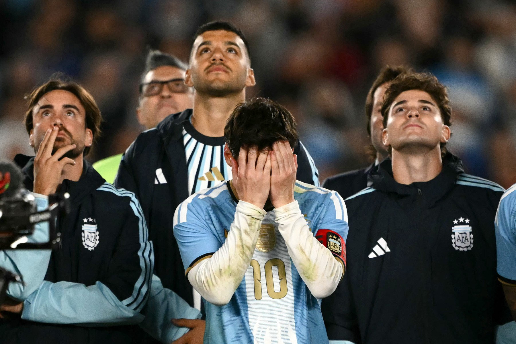 Argentina's forward #10 Lionel Messi cries in a tribute after the international fri
