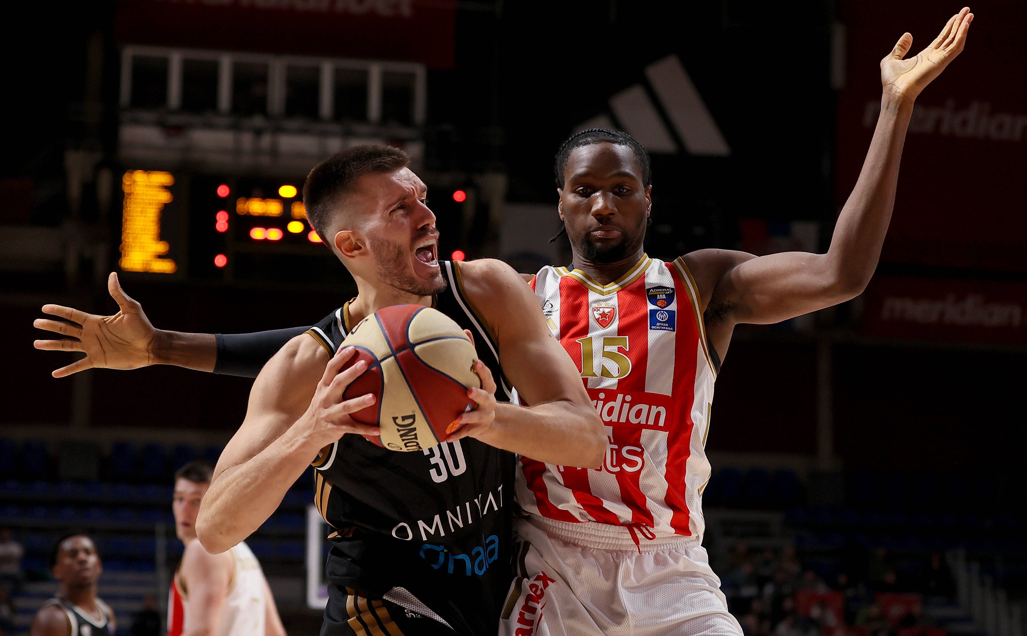 Filip Petrusev Of Dubai (L) in action against Ebuka Izundu of Crvena Zvezda (R)