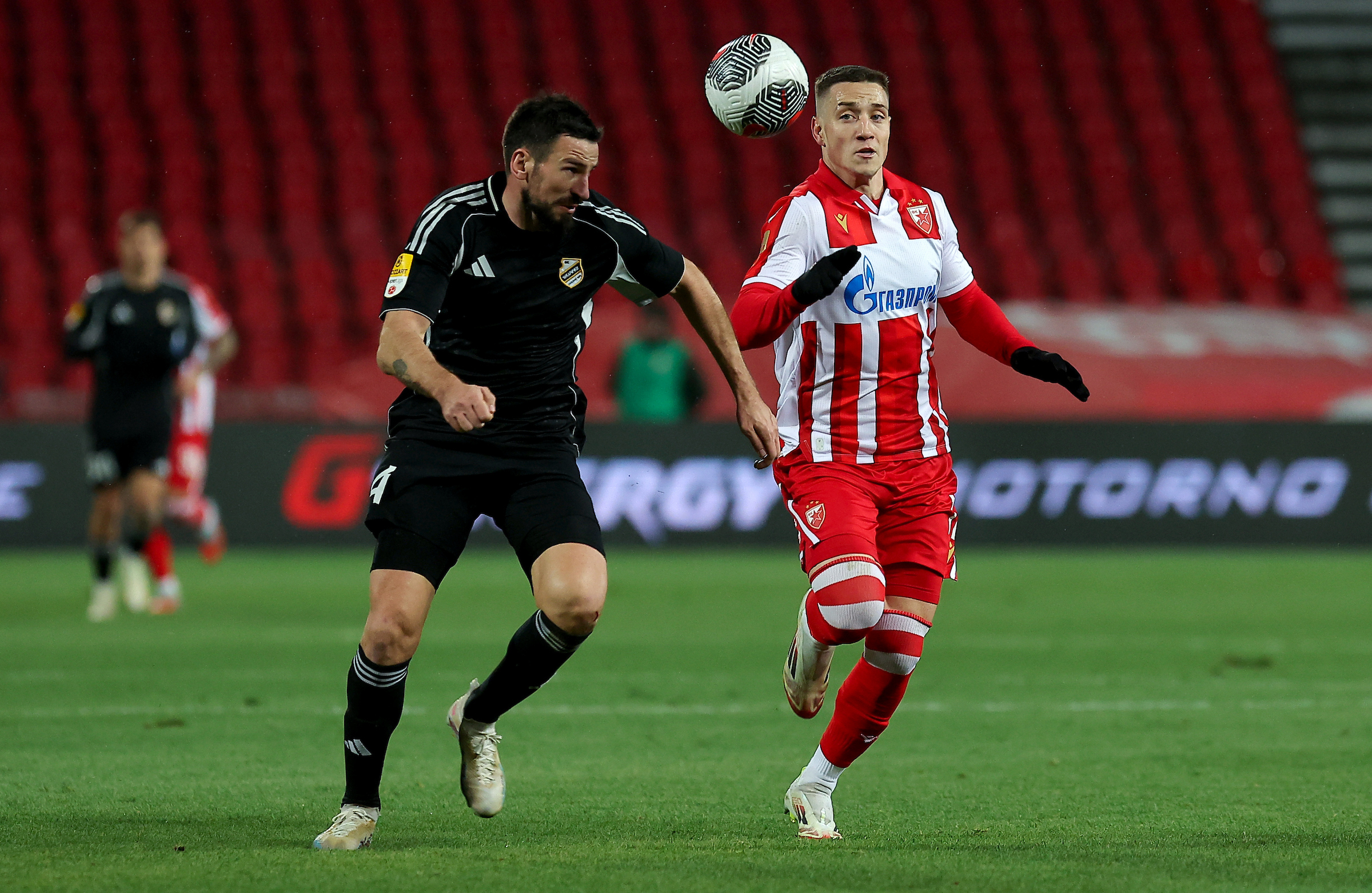 Nenad Tomovic of Cukaricki (L) in action against Bruno Duarte Da Silva