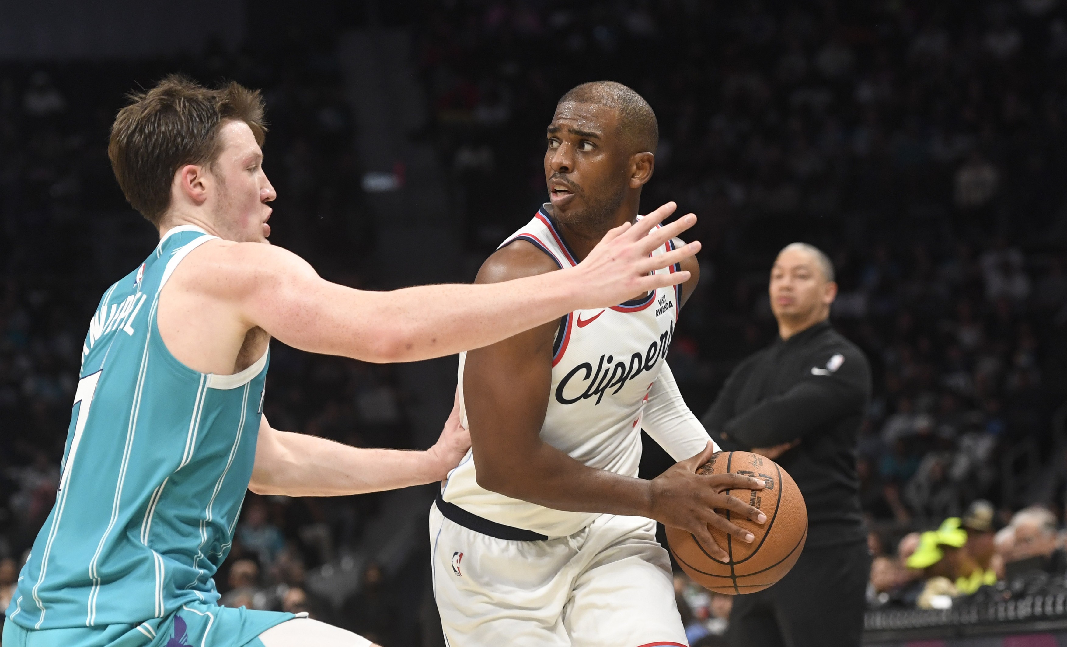 Los Angeles Clippers guard Chris Paul (3) Charlotte Hornets guard Koa Knueppel (7)