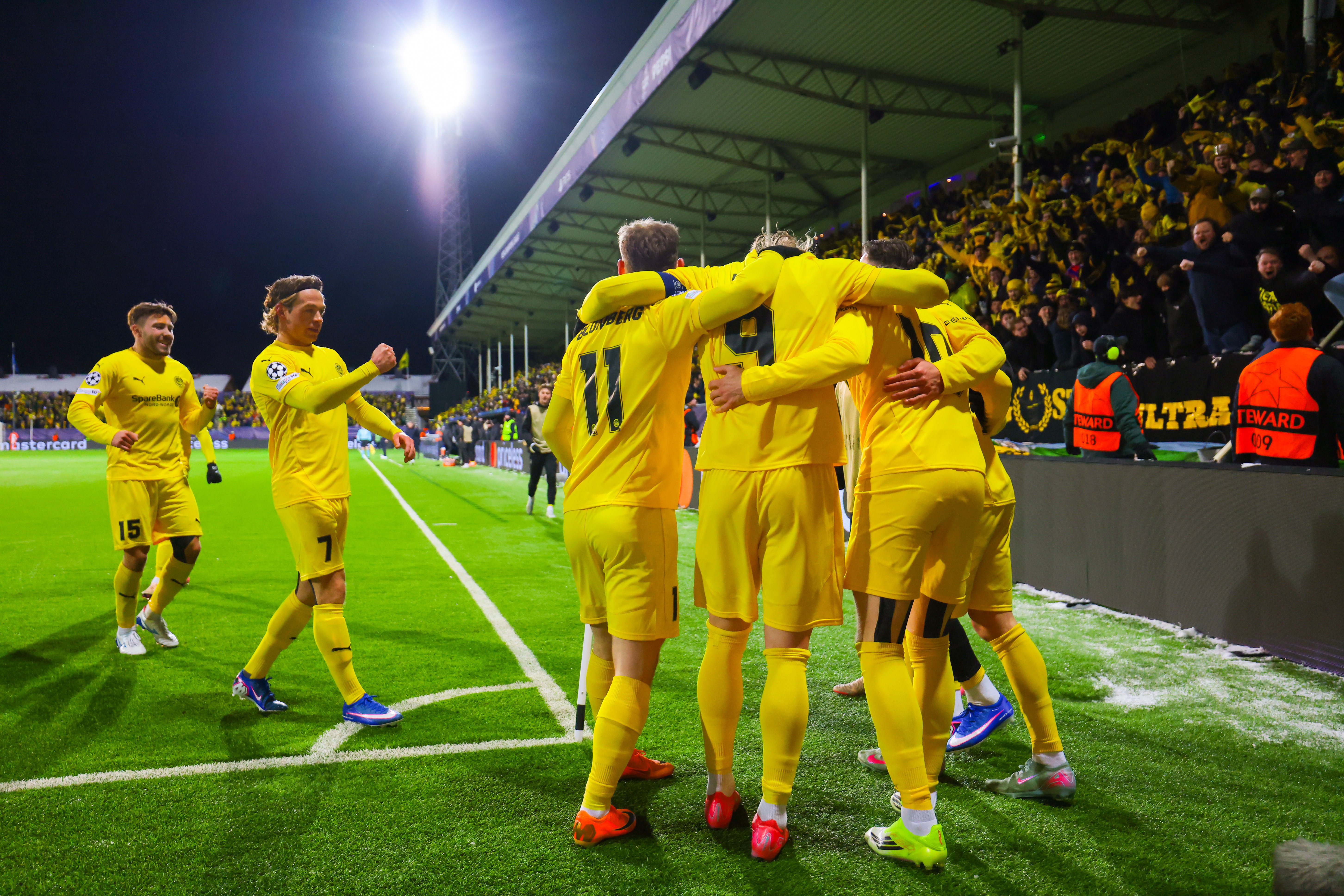 Bodo/Glimt's Jens Kasper Hogh (C) celebrates scoring a goal during the UEFA Champions League play-offs 1st leg soccer match between Bodo/Glimt and Inter