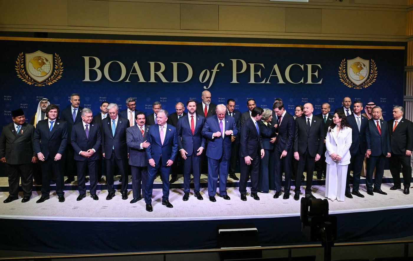US President Donald Trump (C), flanked by US Vice President JD Vance (L) and US Secretary of State Marco Rubio (R)