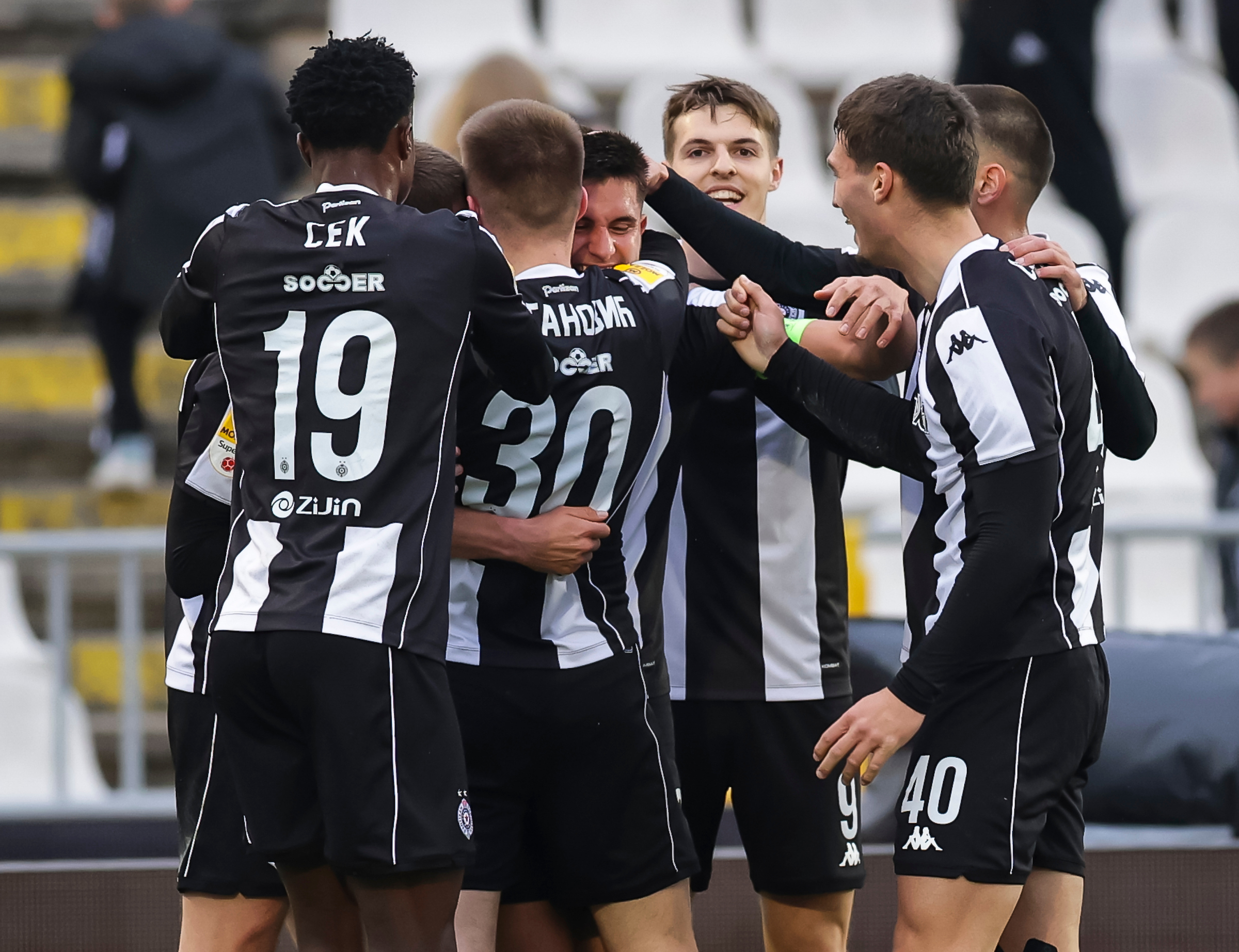 Vanja Dragojevic (C) of Partizan celebrates after scoring a goal with Demba Sek, Milan Roganovic, Andrej Kostic, Nikola Simic and Stefan Milic