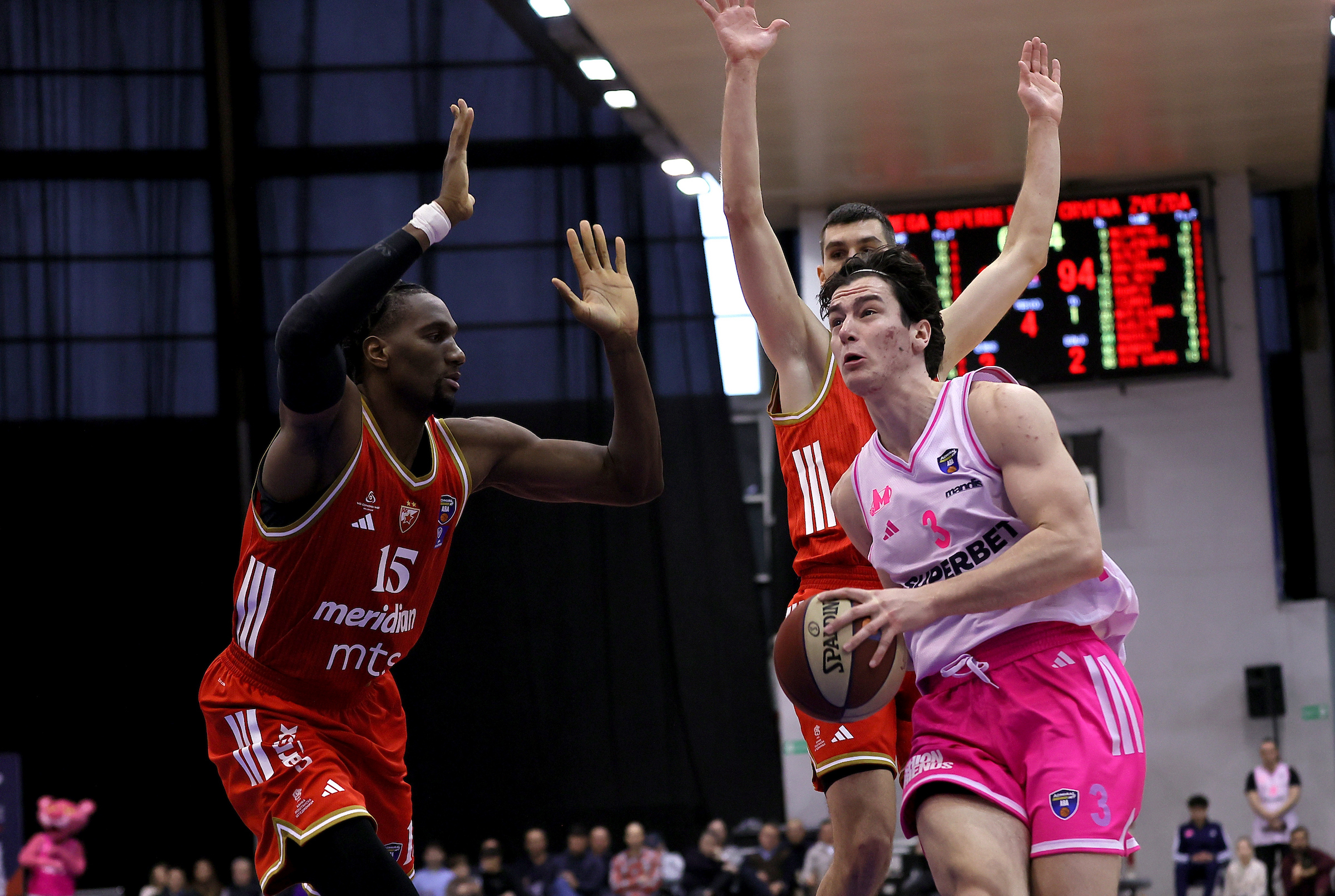 Ebuka Izundu in action against Asim Djulovic during Mega v Crvena Zvezda basketball match