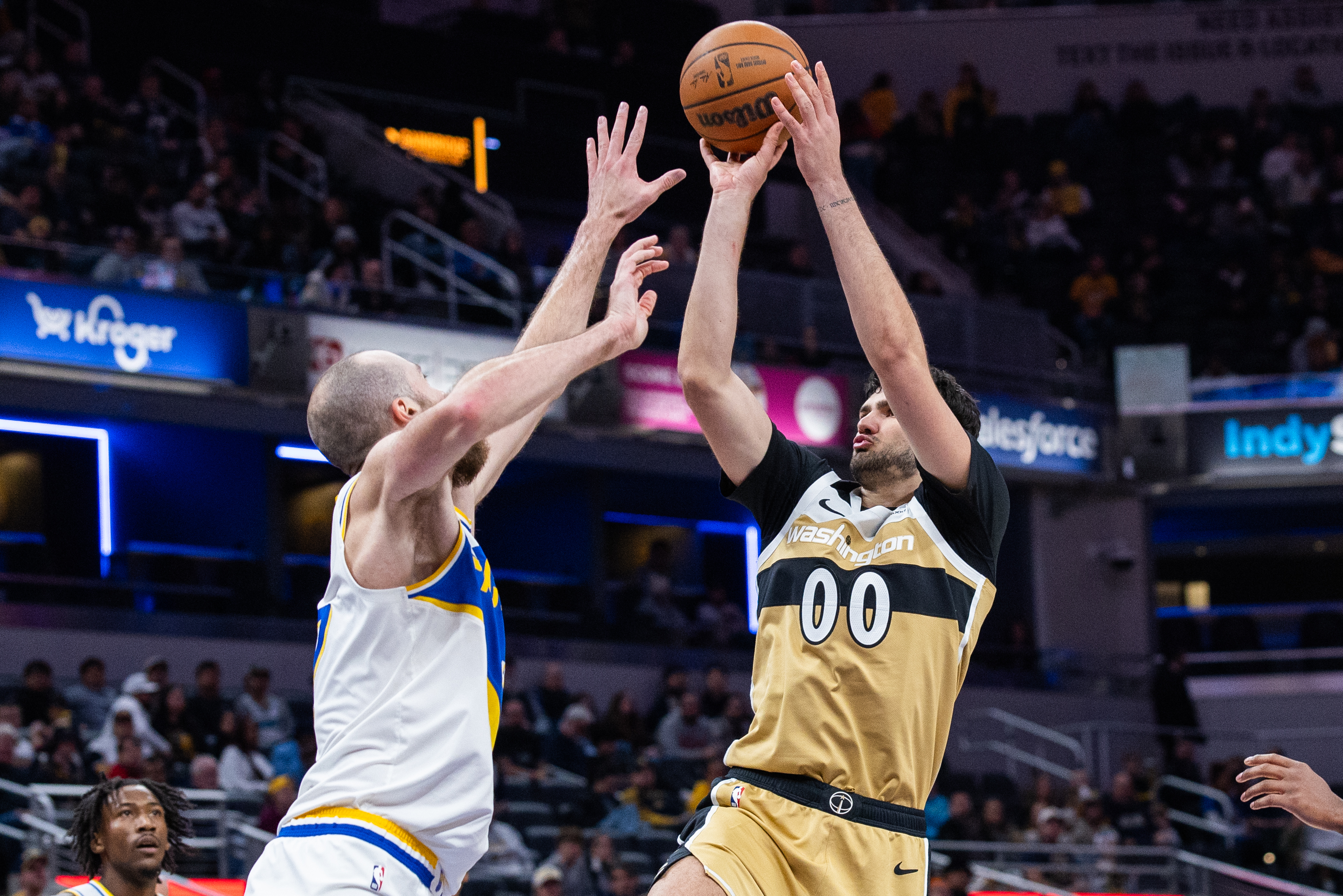 Washington Wizards forward Tristan Vukcevic (00) shoots the ball