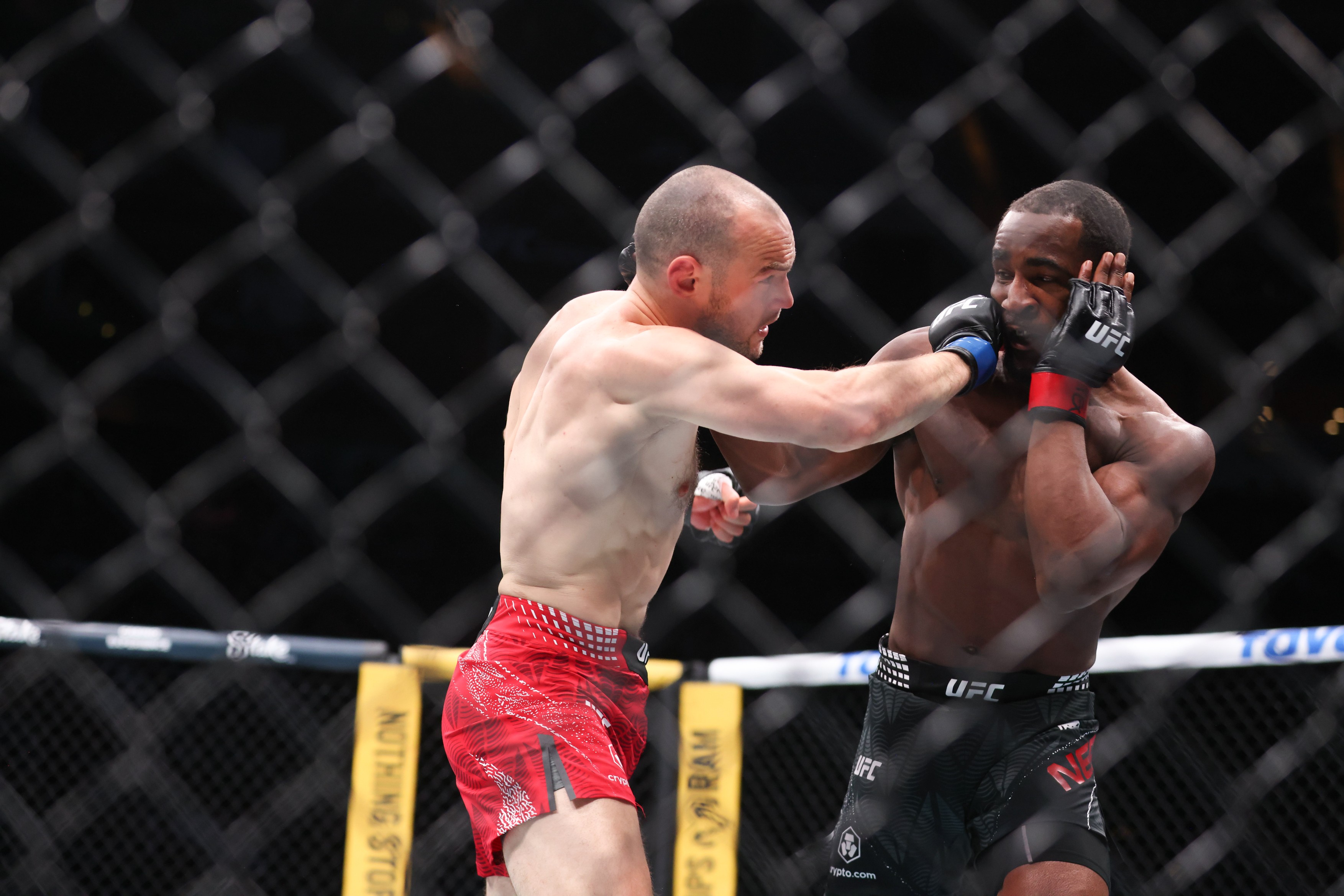 February 21, 2026, Houston, Tx, USA: HOUSTON, TEXAS - FEBRUARY 21: (L-R) Uros Medic punches Geoff Neal