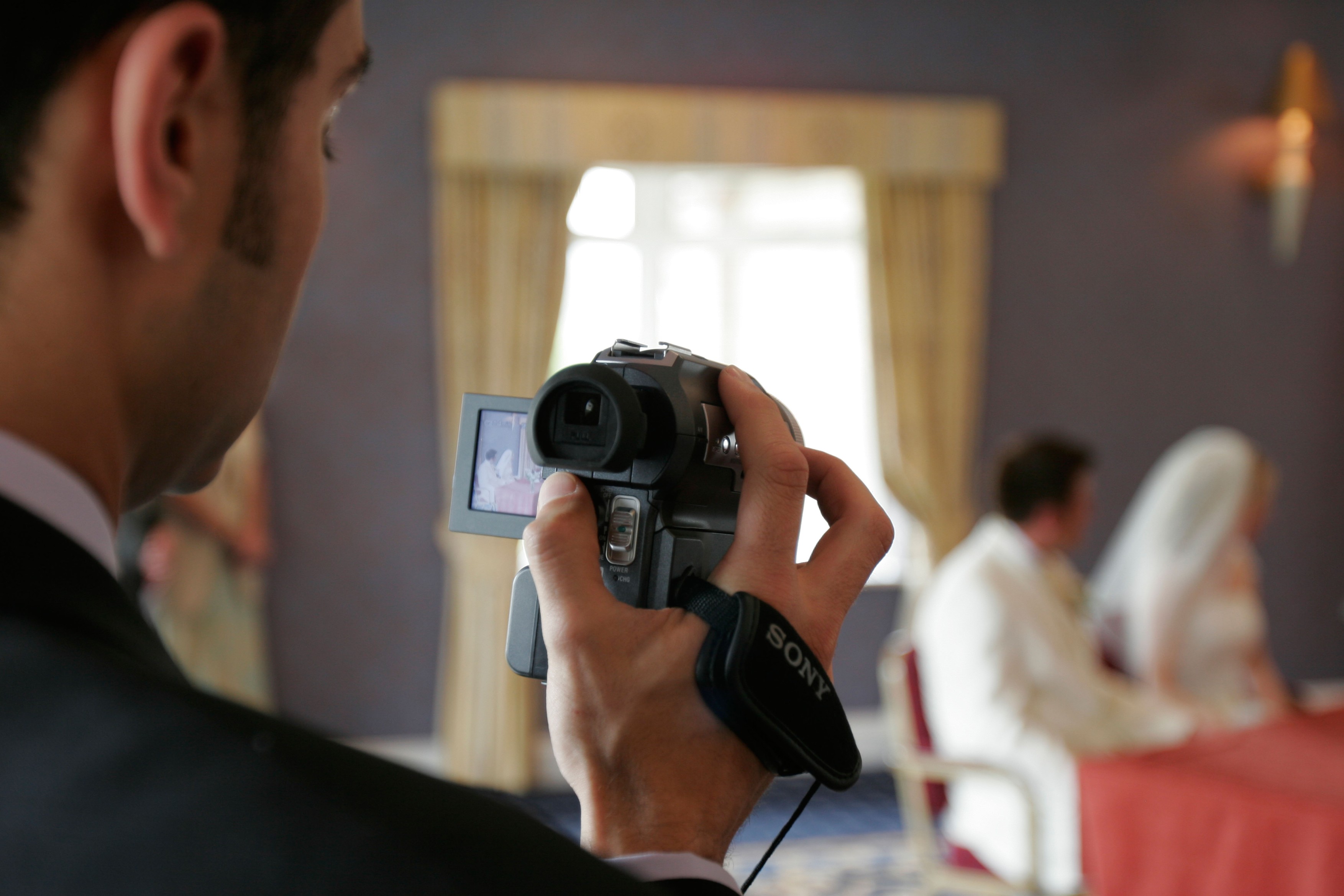 wedding video record recording camcorder camera celebratory wed nuptials marital couple