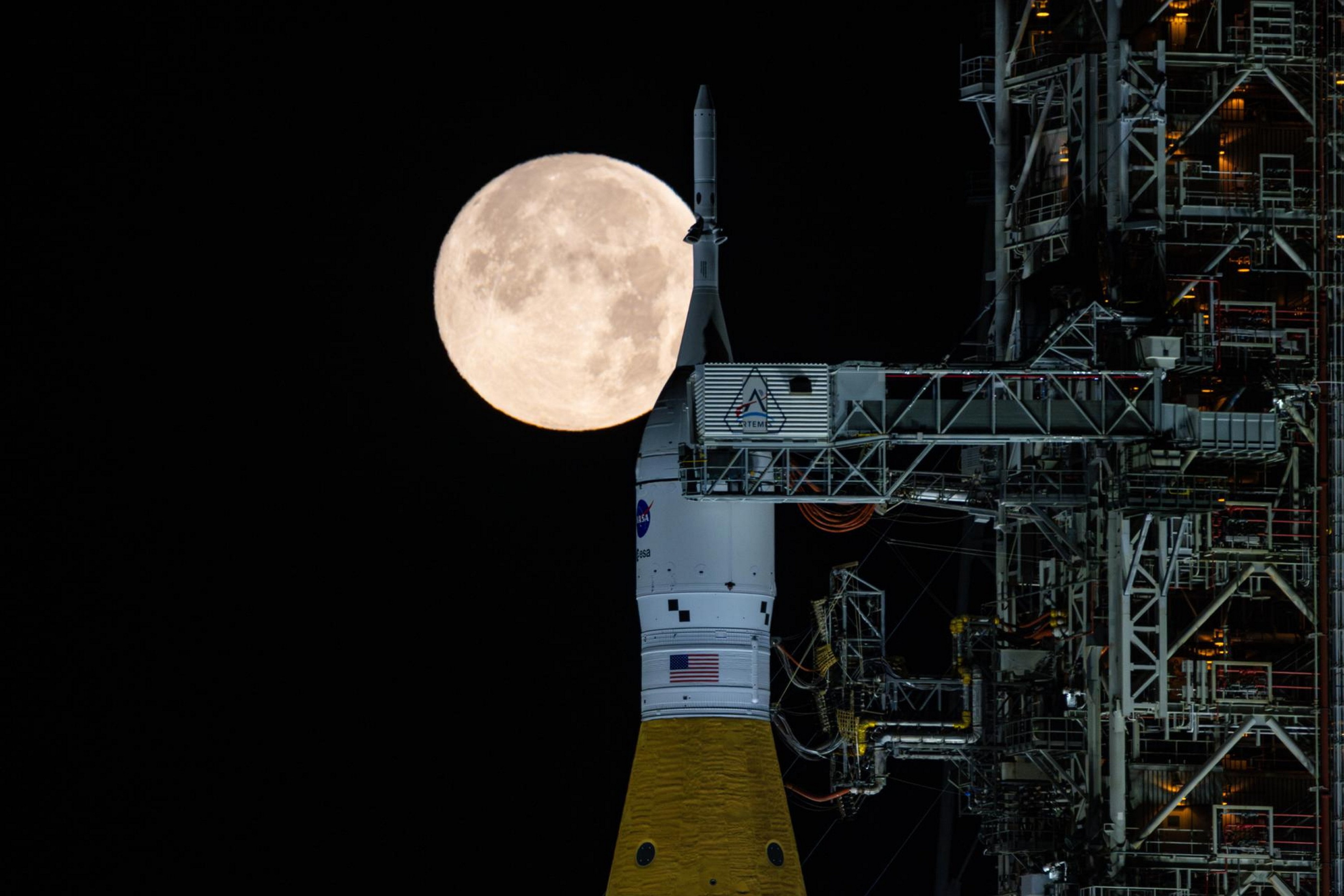 A full Moon is seen shining over NASA�s SLS