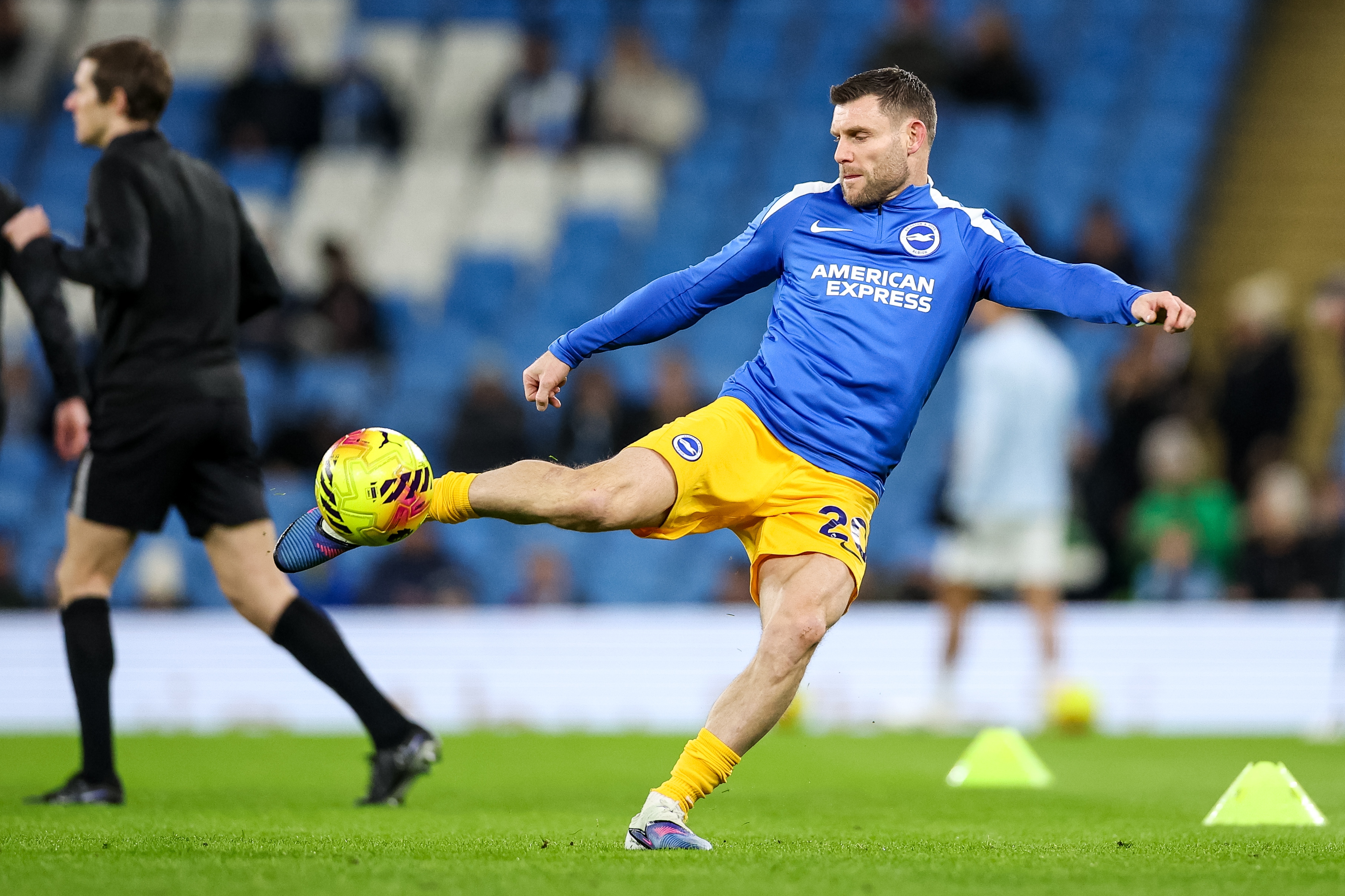 James Milner of Brighton warms up prior to the English Premier League