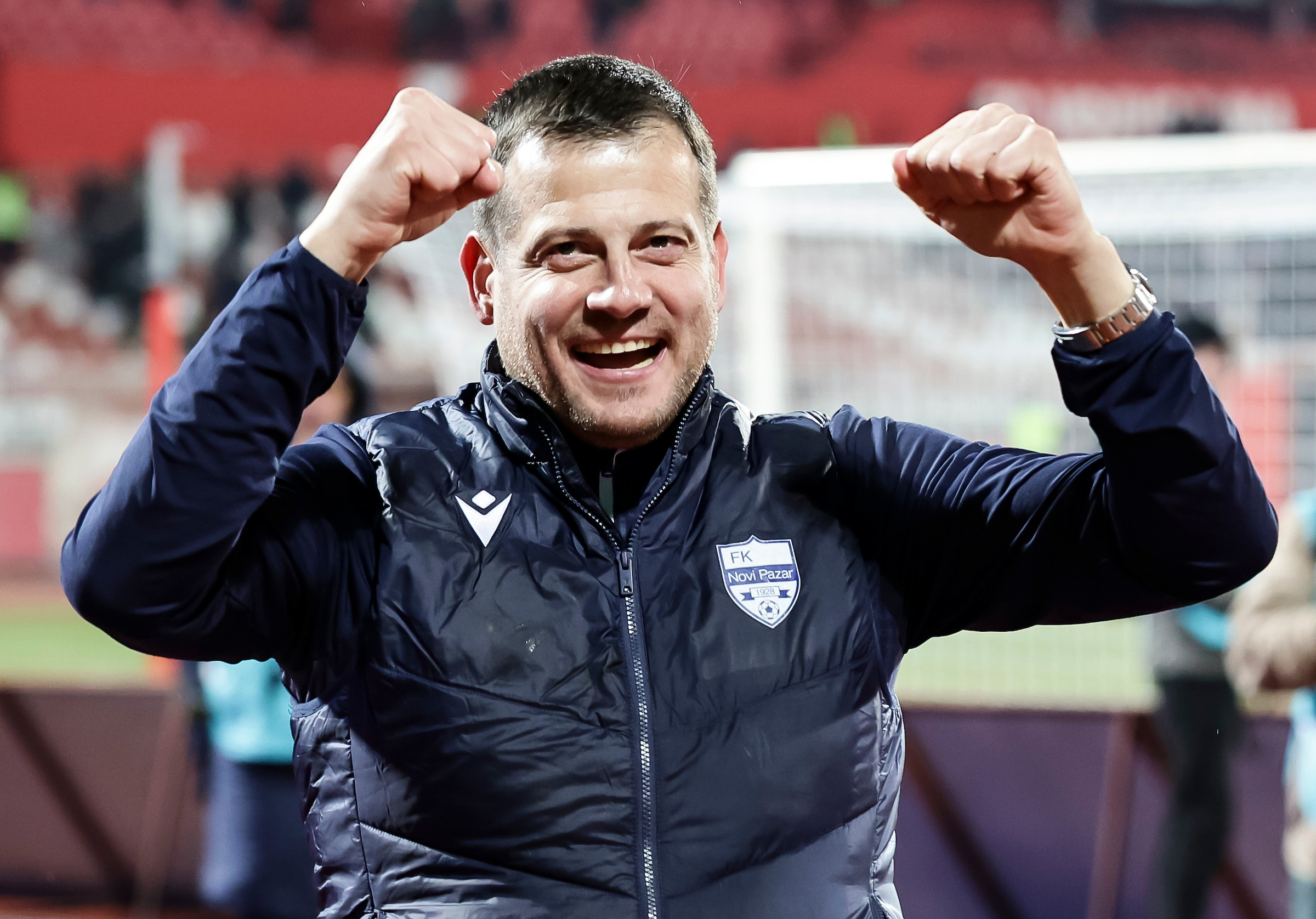 Head coach Nenad Lalatovic of Novi Pazar celebrates after winning