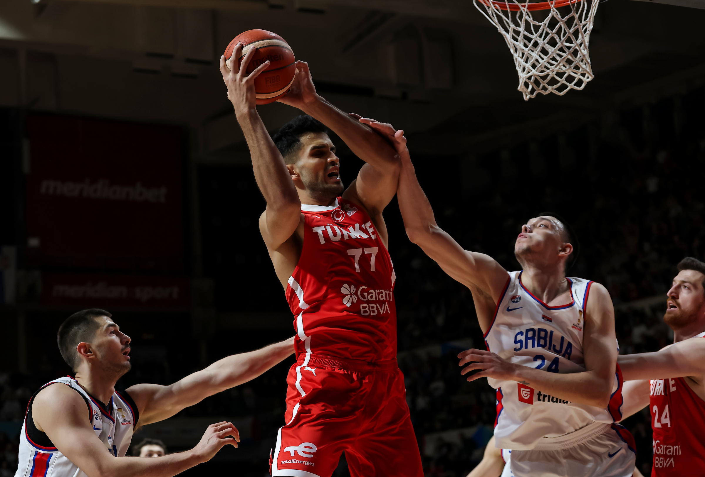 Omer Yurtseven (C) of Turkiye in action against Luka Mitrovic and Nikola Tanaskovic (R) of Serbia during the FIBA World Cup European qualifiers first round group C basketball match between Serbia and Turkiye on February 27, 2026 in Belgrade, Serbia.