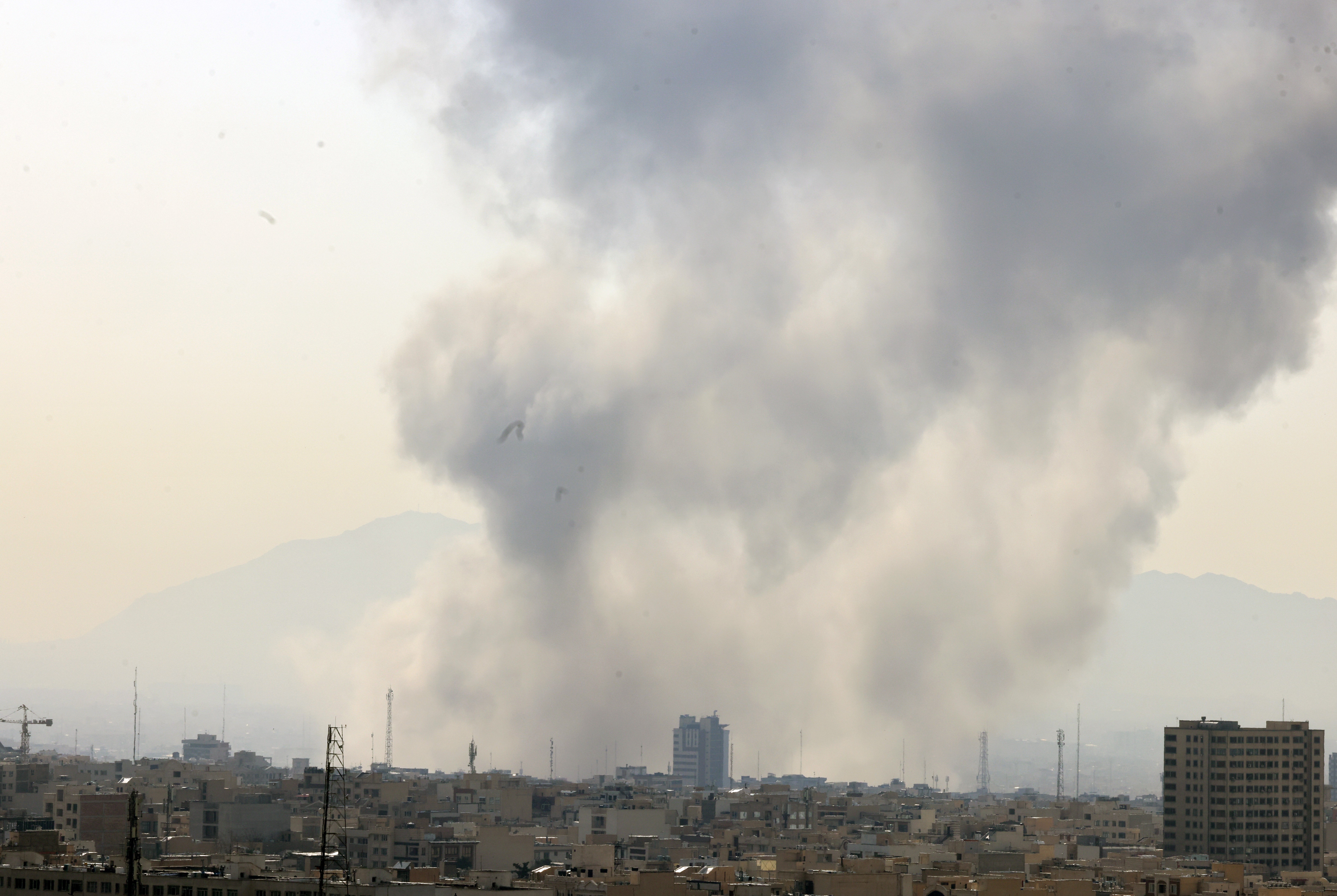 epaselect epa12782928 ?Smoke rises in central Tehran after Israel attack, 28 February 2026. Israel launched an attack on Iran on 28 February 2026, described as a "preemptive strike" by Israeli Defence Minister Israel Katz.  EPA/ABEDIN TAHERKENAREH