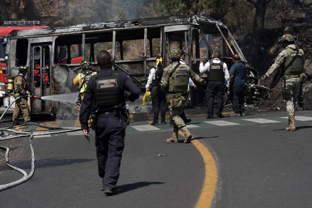 epa12770484 Firefighters and members of the Morelia police