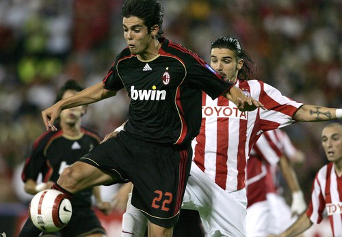 AC Milan's midfielder Kaka (L) vies Crvena Zvezda's forward Blagoy Georgiev