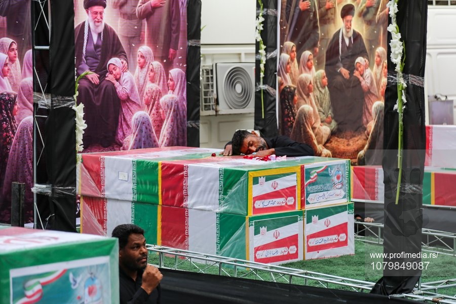 TEHRAN, March 3, 2026  -- A man mourns during a mass funeral ceremony for students and staff members killed in a United States-Israeli attack on a school in Minab, Iran's southern province of Hormozgan,