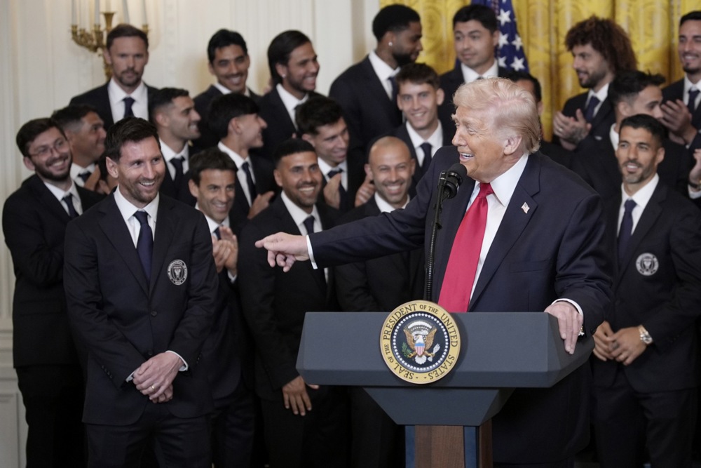 epa12797951 US President Donald Trump (2-R) talks with captain Lionel Messi (L)