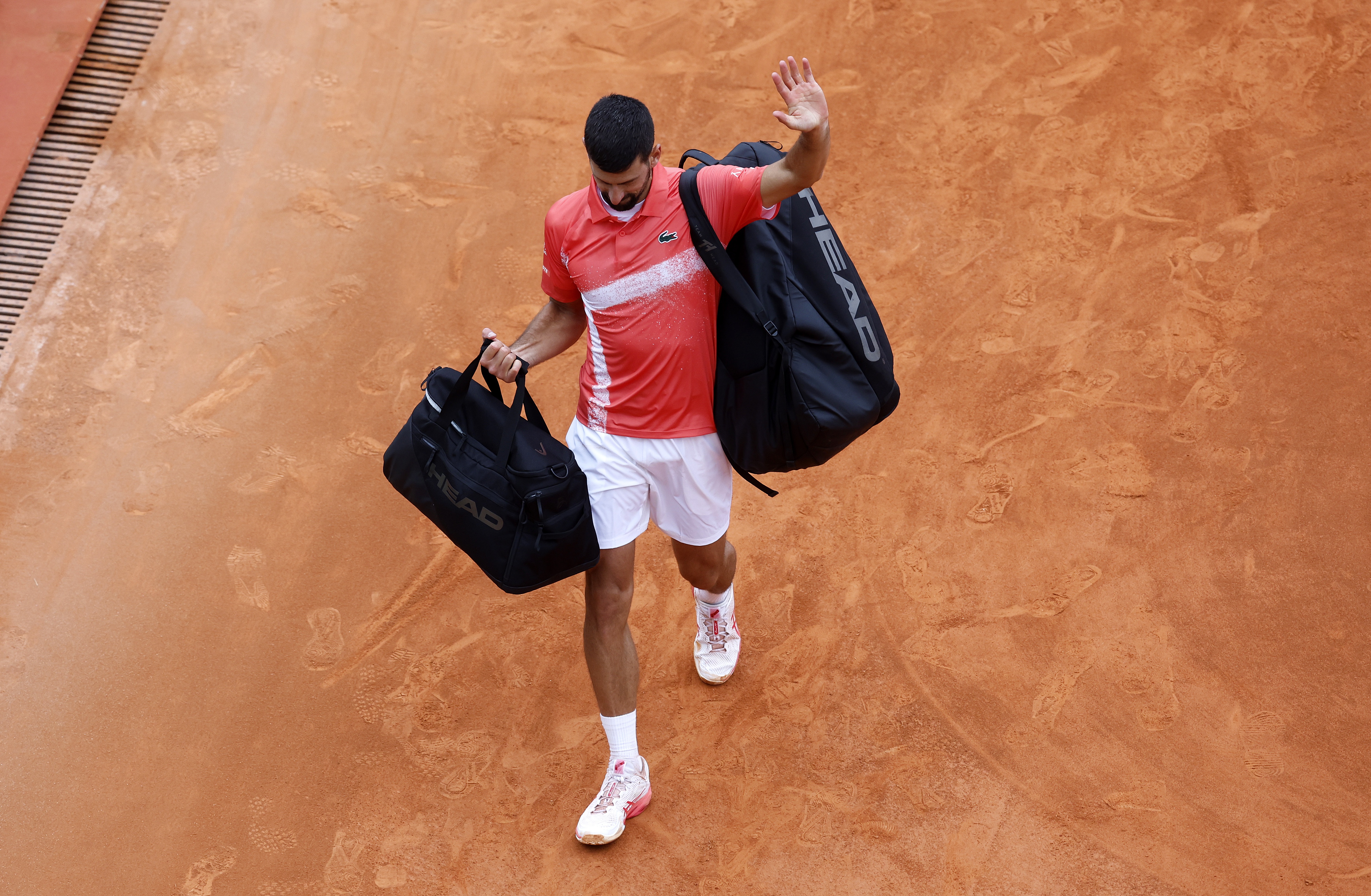 Novak Djokovic of Serbia leaves the court after losing his match against Alejandro Tabilo of Chile at the ATP Monte Carlo Masters tennis tournament
