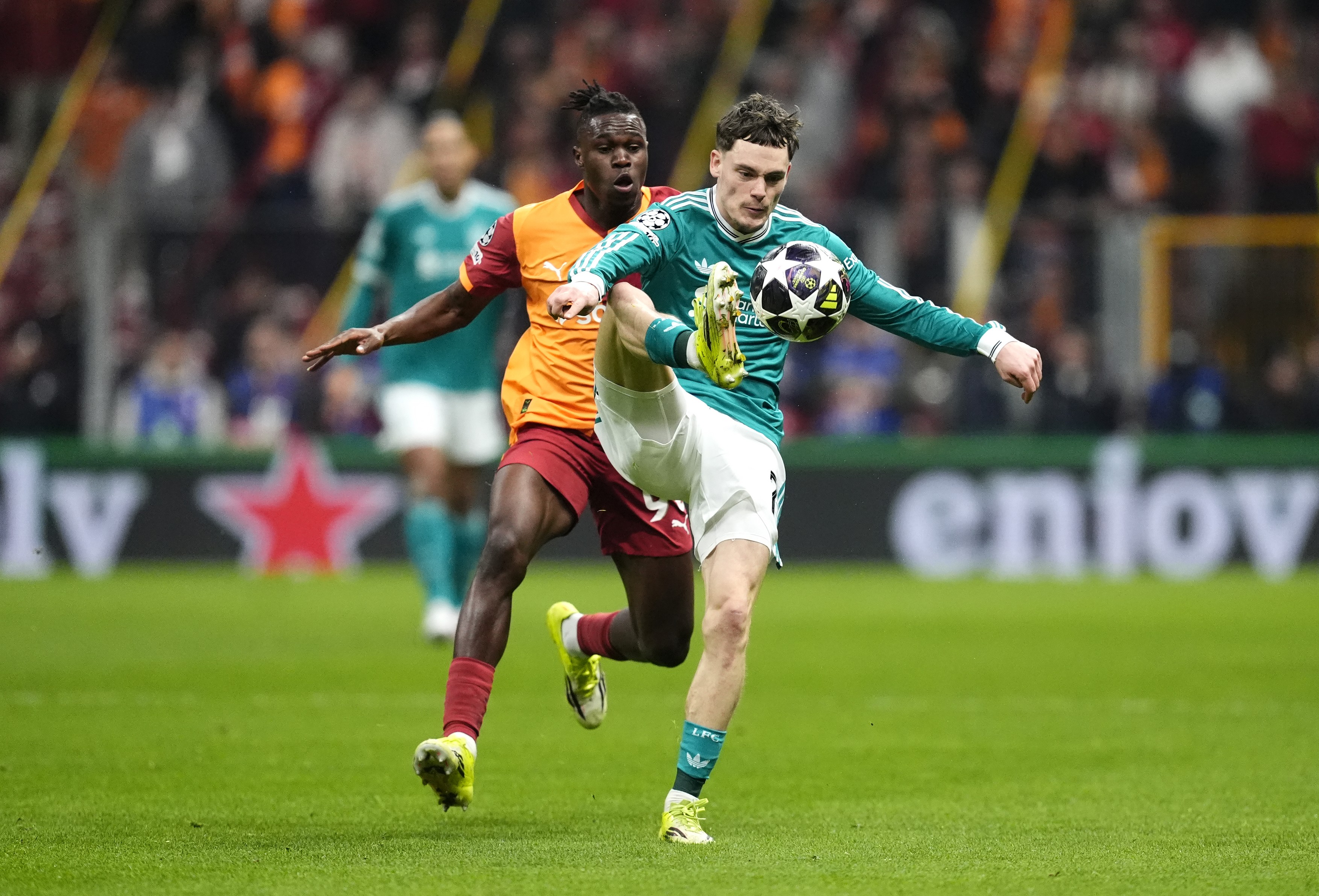 Galatasaray's Wilfried Singo (left) and Liverpool's Florian Wirtz battle for the ballduring the UEFA Champions League round of sixteen, first leg match at the Ali Sami Yen Sports Complex in Istanbul, Turkey.