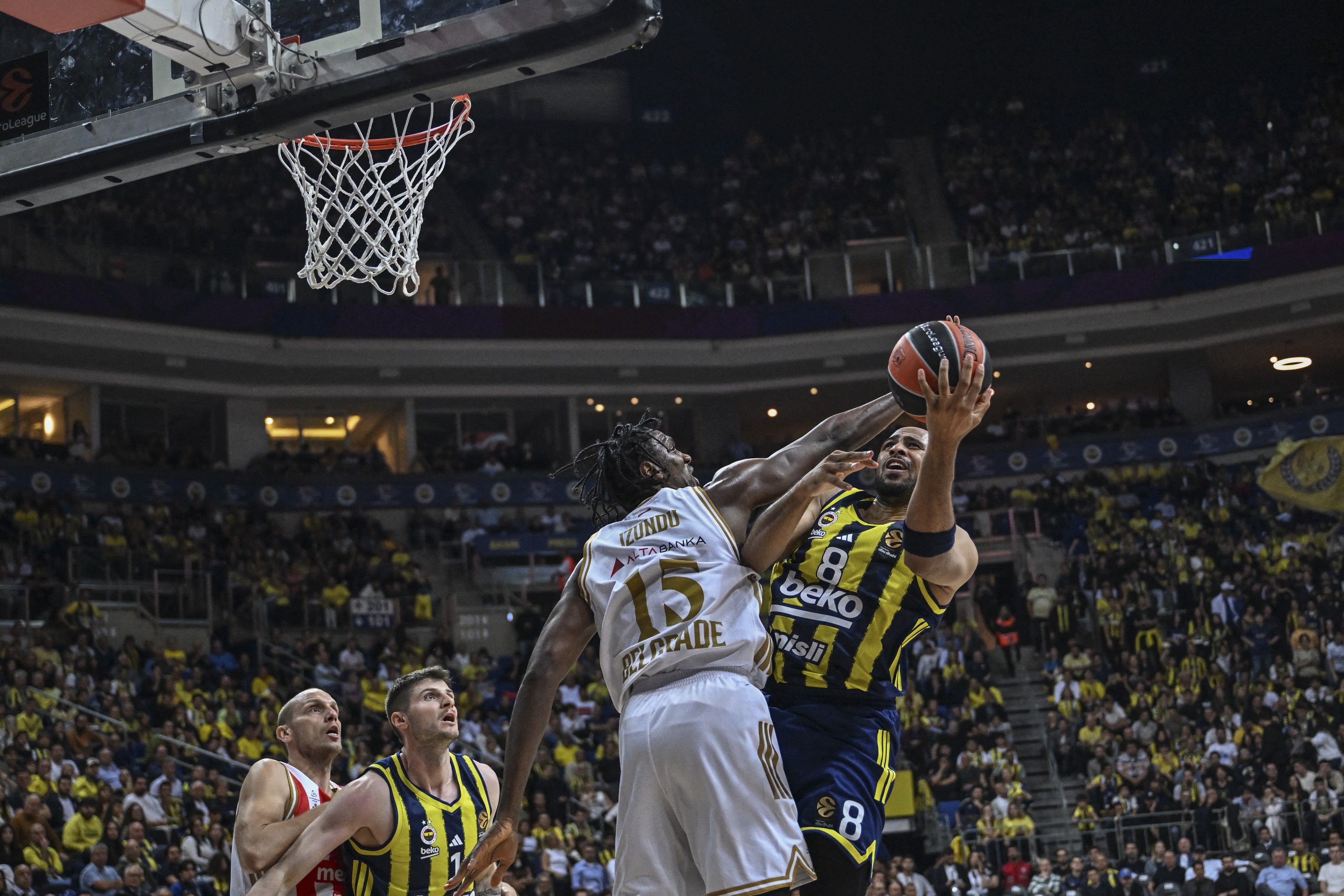 Talen Horton (8) of Fenerbahce Beko and Ebuka Izundu (L) of Crvena Zvezda compete during the EuroLeague basketball match
