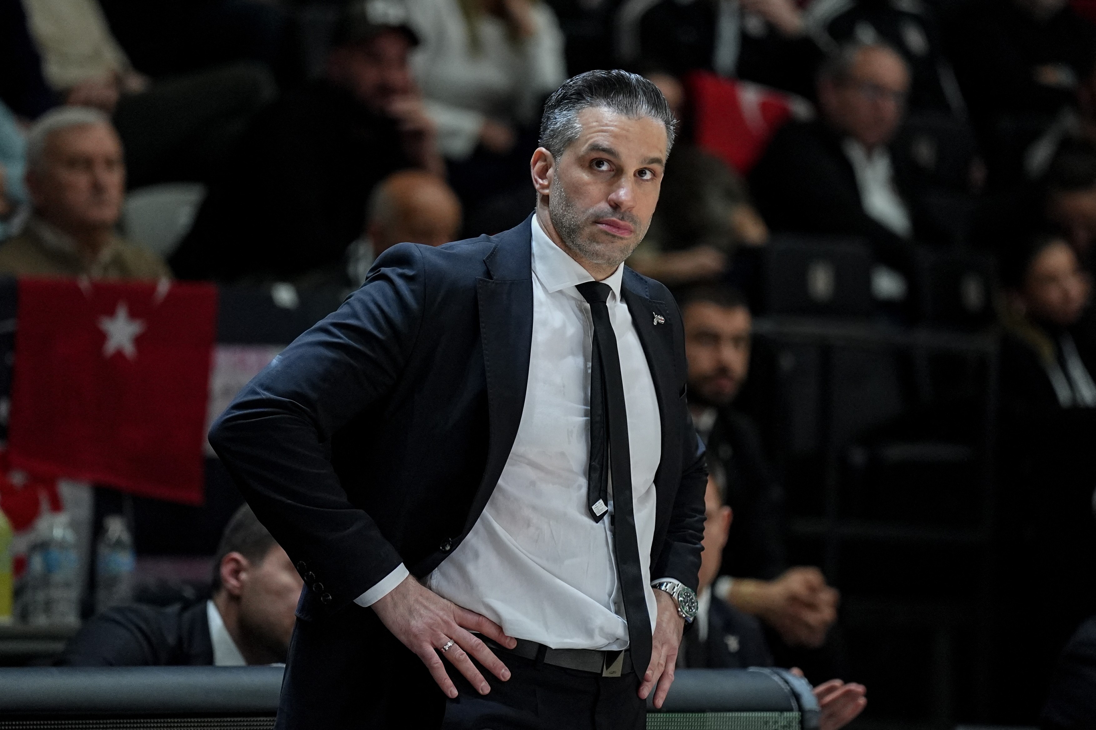 Besiktas GAIN head coach Dusan Alimpijevic watches the game during the BKT EuroCup quarterfinal basketball match between Besiktas GAIN and Dolomiti Energia Trento at BJK GAIN Sports Hall in Istanbul, Turkey