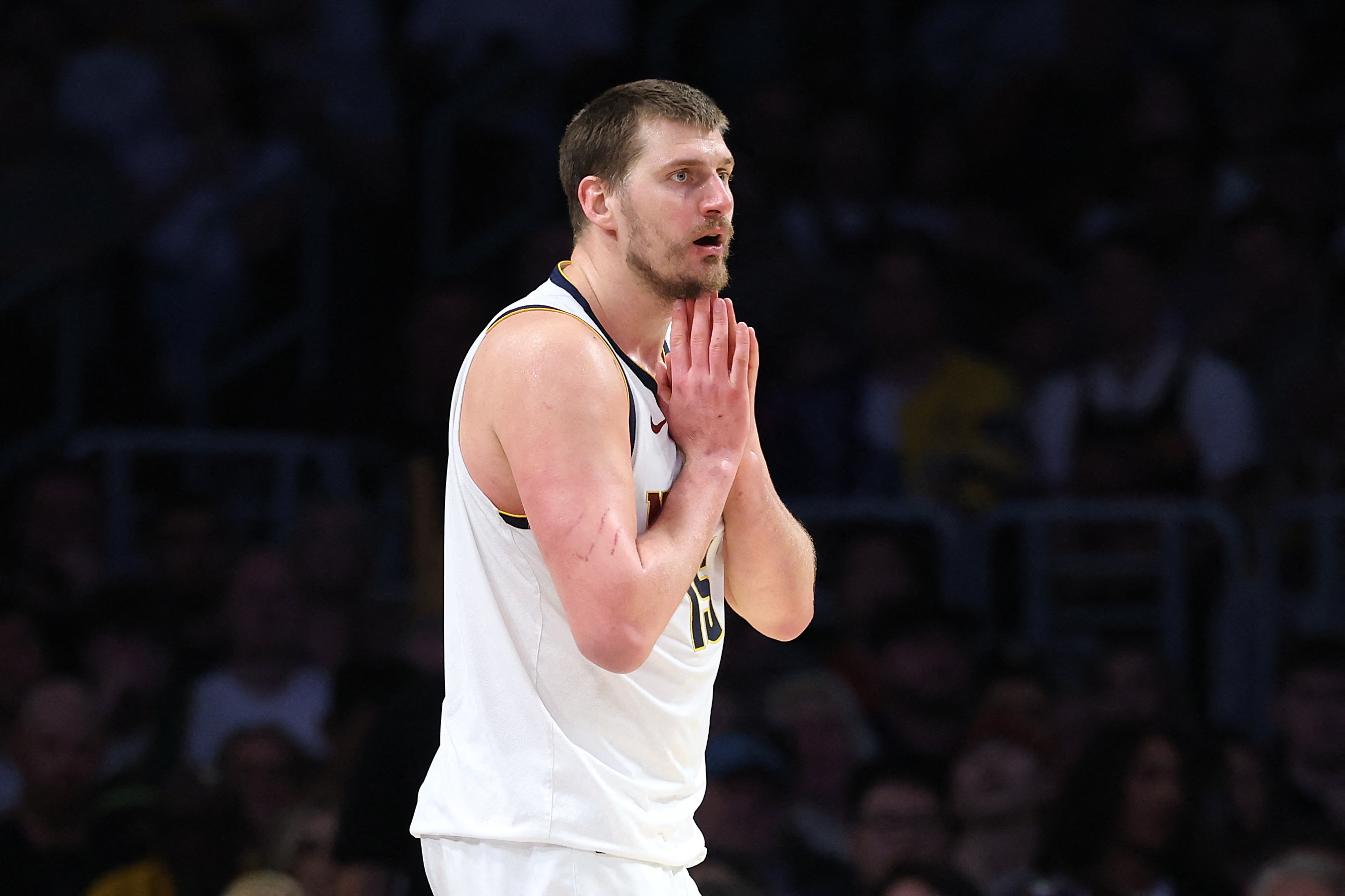 Nikola Jokic #15 of the Denver Nuggets reacts to a foul