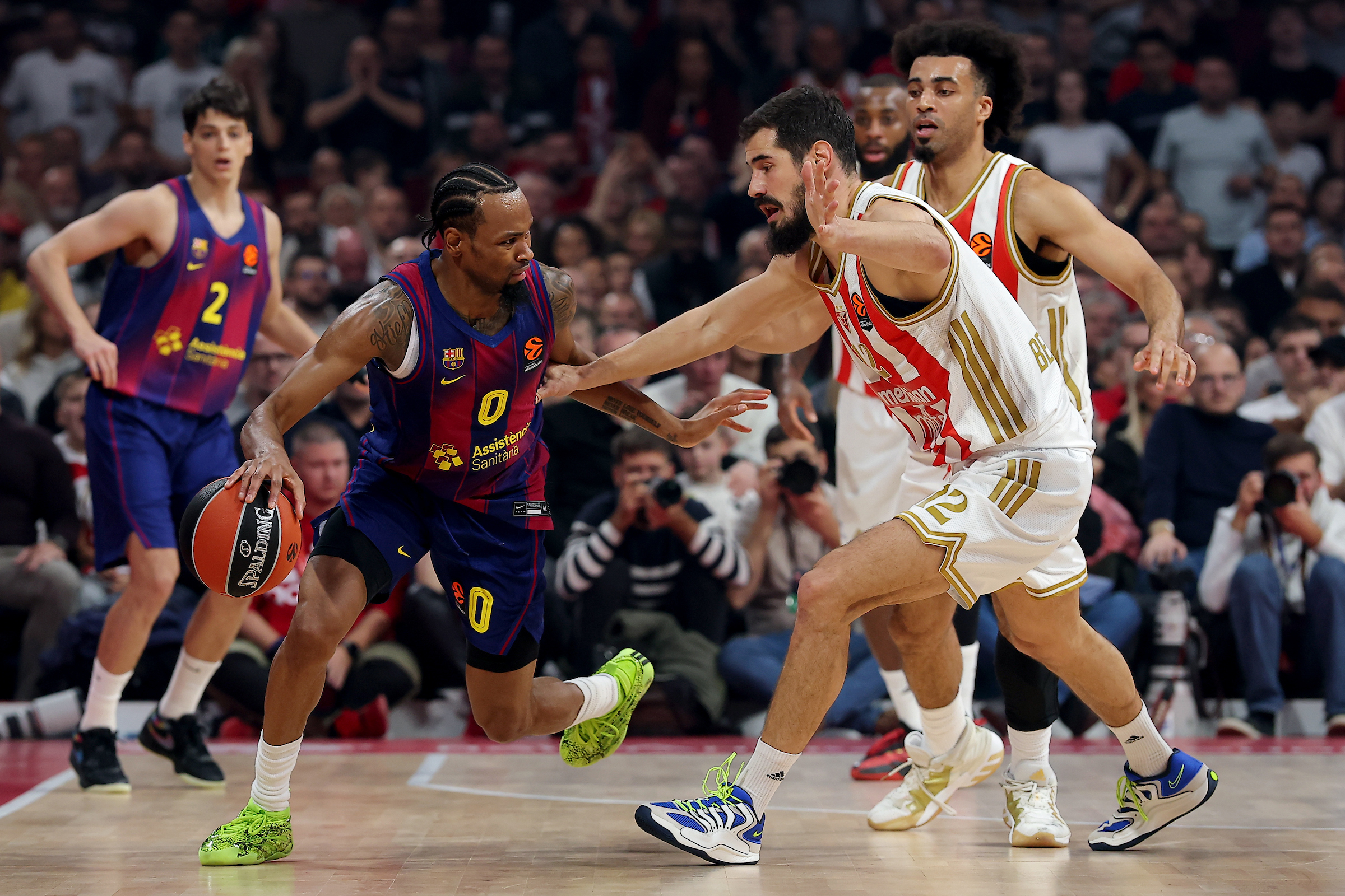 Kevin Punter of Barcelona, Nikola Kalinic and Jordan Nwora of Crvena Zvezda in action