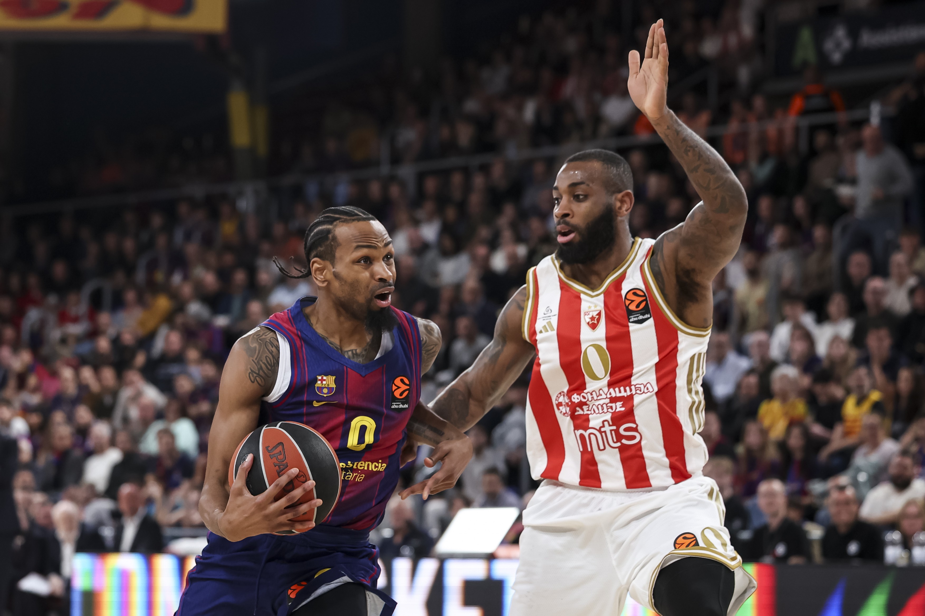 Kevin Punter of FC Barcelona and Codi Miller-McIntyre of Crvena Zvezda Belgrade