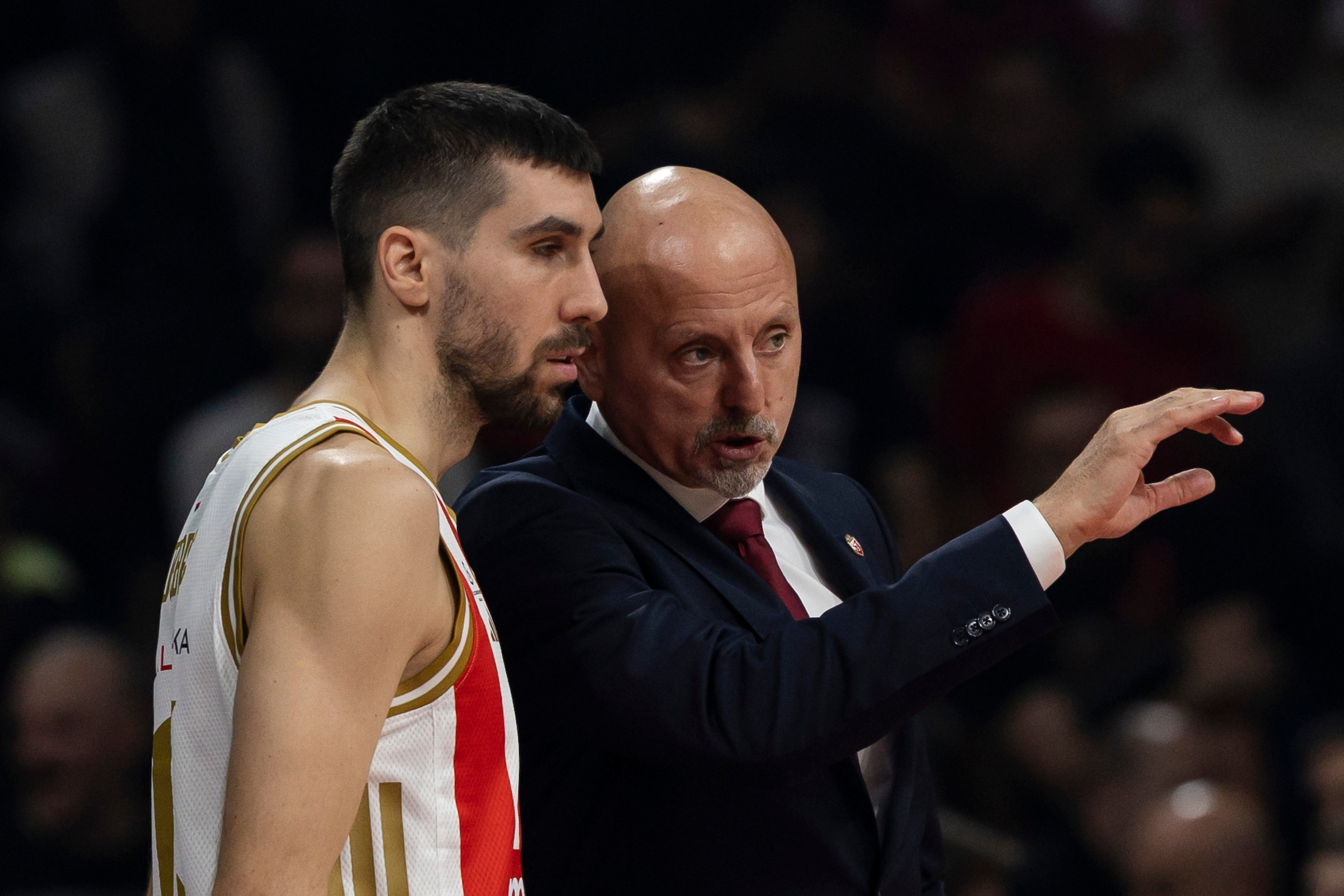 Sasa Obradovic, Head Coach of Crvena Zvezda Belgrade speaks to Ognjen Dobric # 13