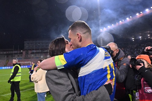 Bosnia-Herzegovina's forward #11 Edin Dzeko kisses hi