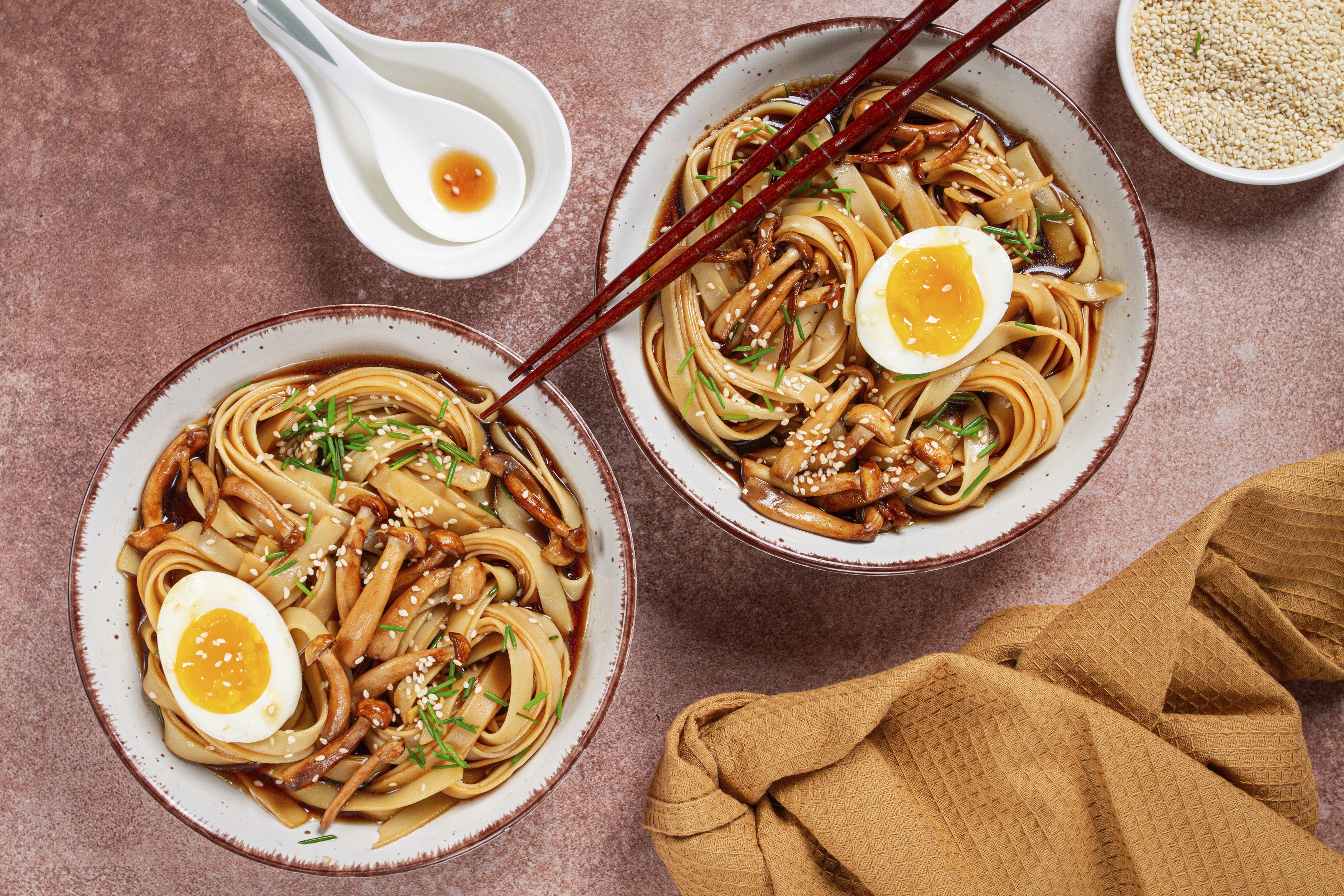 Buckwheat noodles soba with shimeji mushrooms, with boiled egg, green onion,
