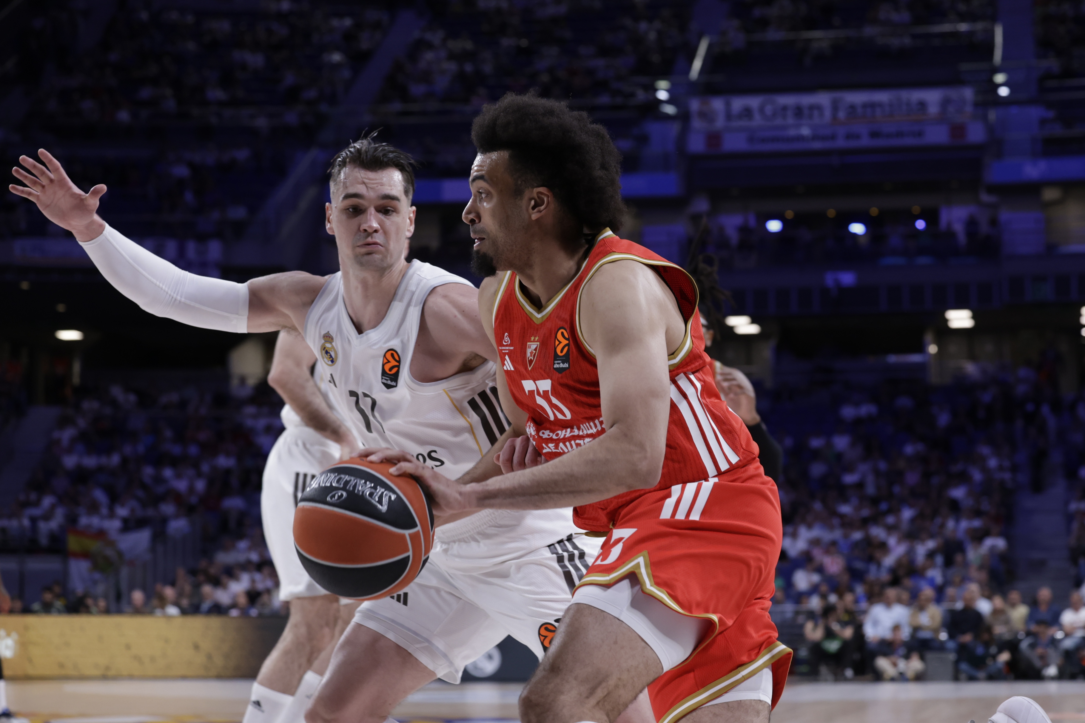 Red Star's Jordan Nwora (R) in action against Real Madrid's Mario Hezonja (L)
