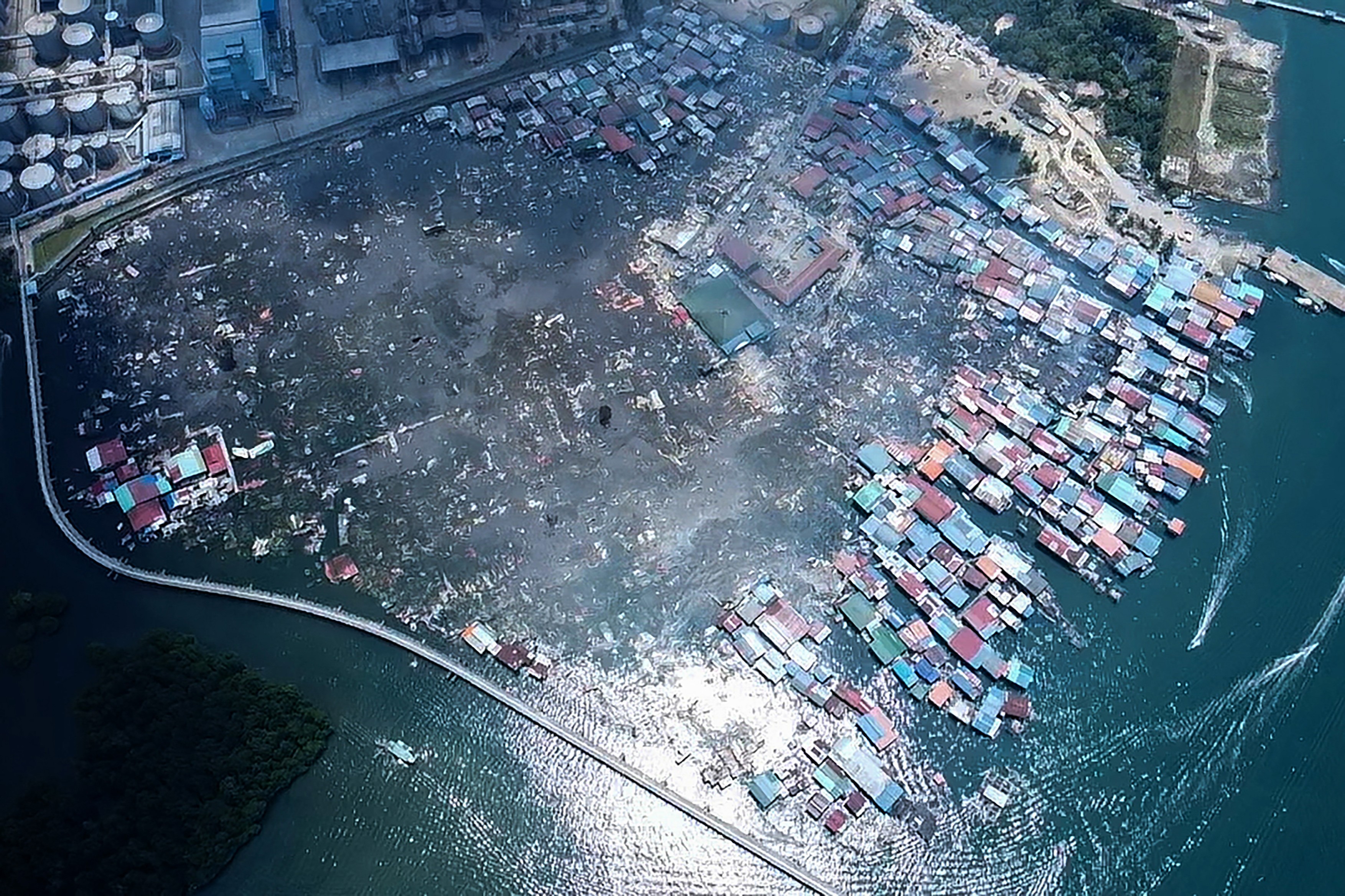 This handout photo taken and released by Malaysia’s Sandakan Fire and Rescue Departm