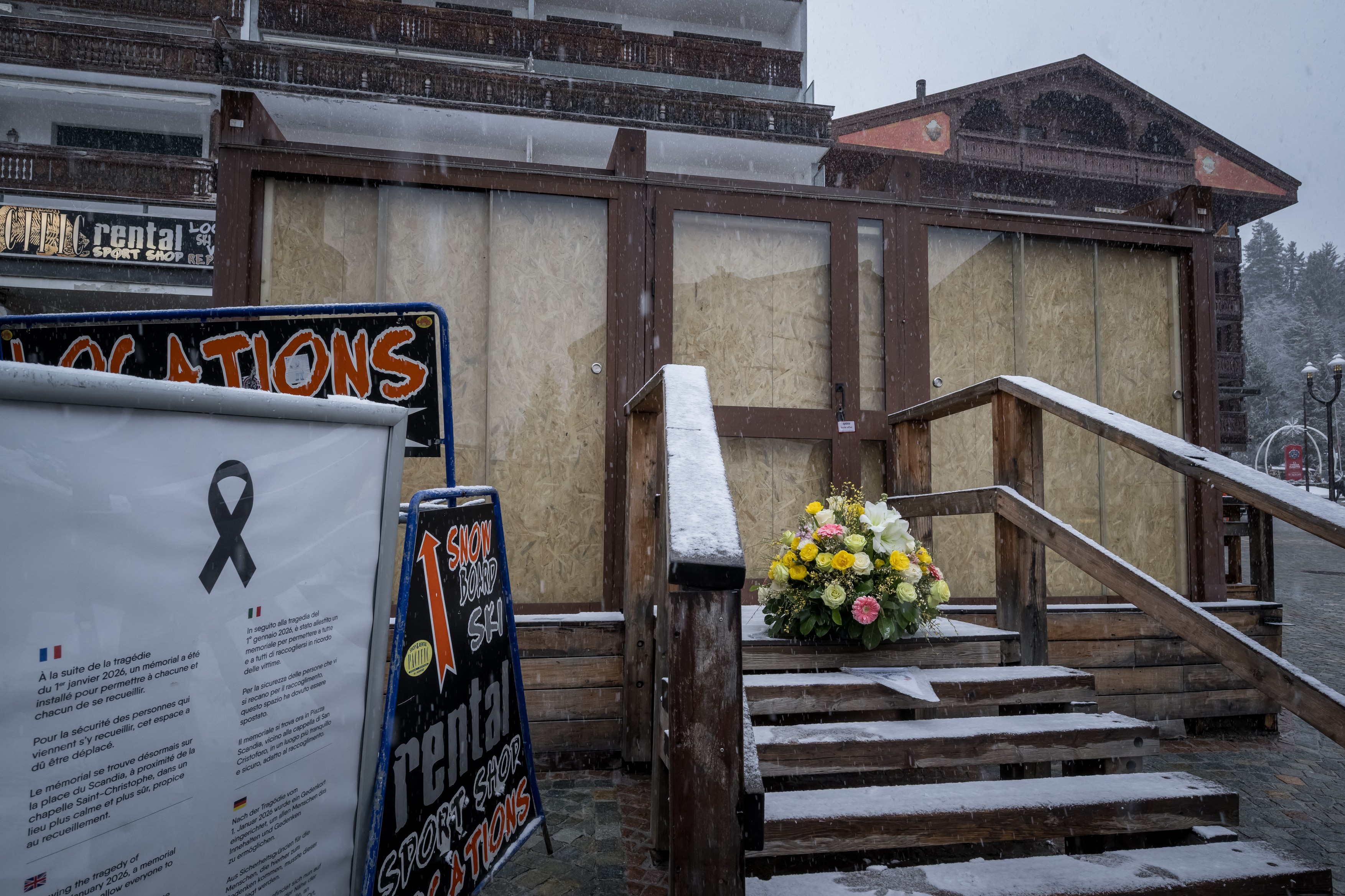 This photograph shows flowers left