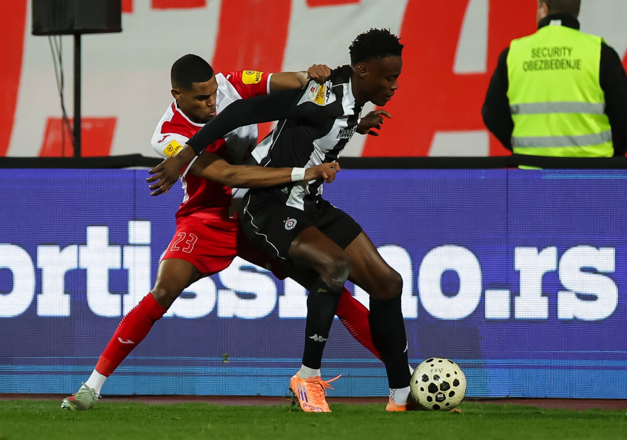 Demba Seck (R) of Partizan in action against Lucas Barros of Vojvodina