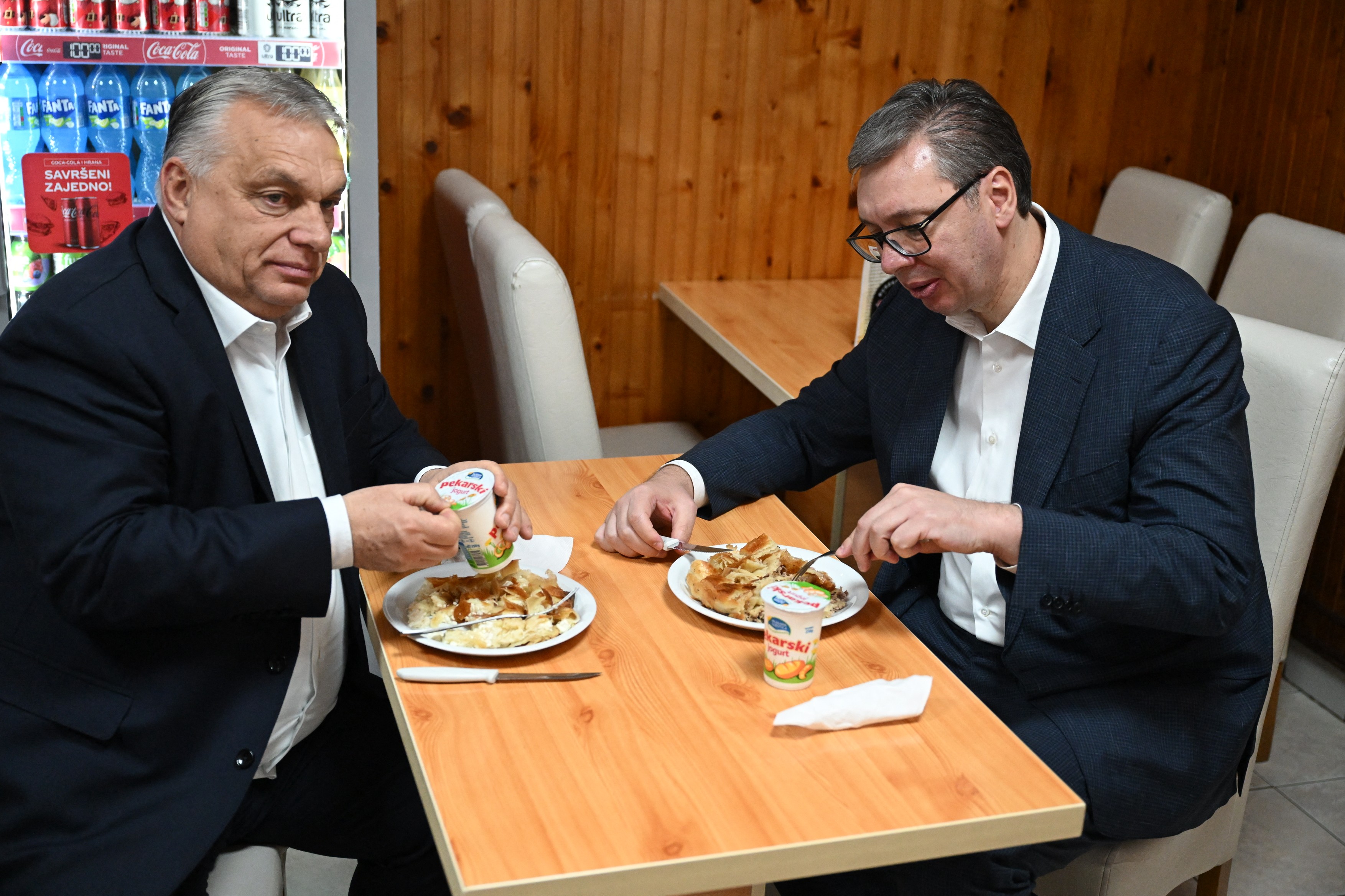 , Aleksandar Vucic (R) flanked by Hungary's Prime Minister, Viktor Orban
