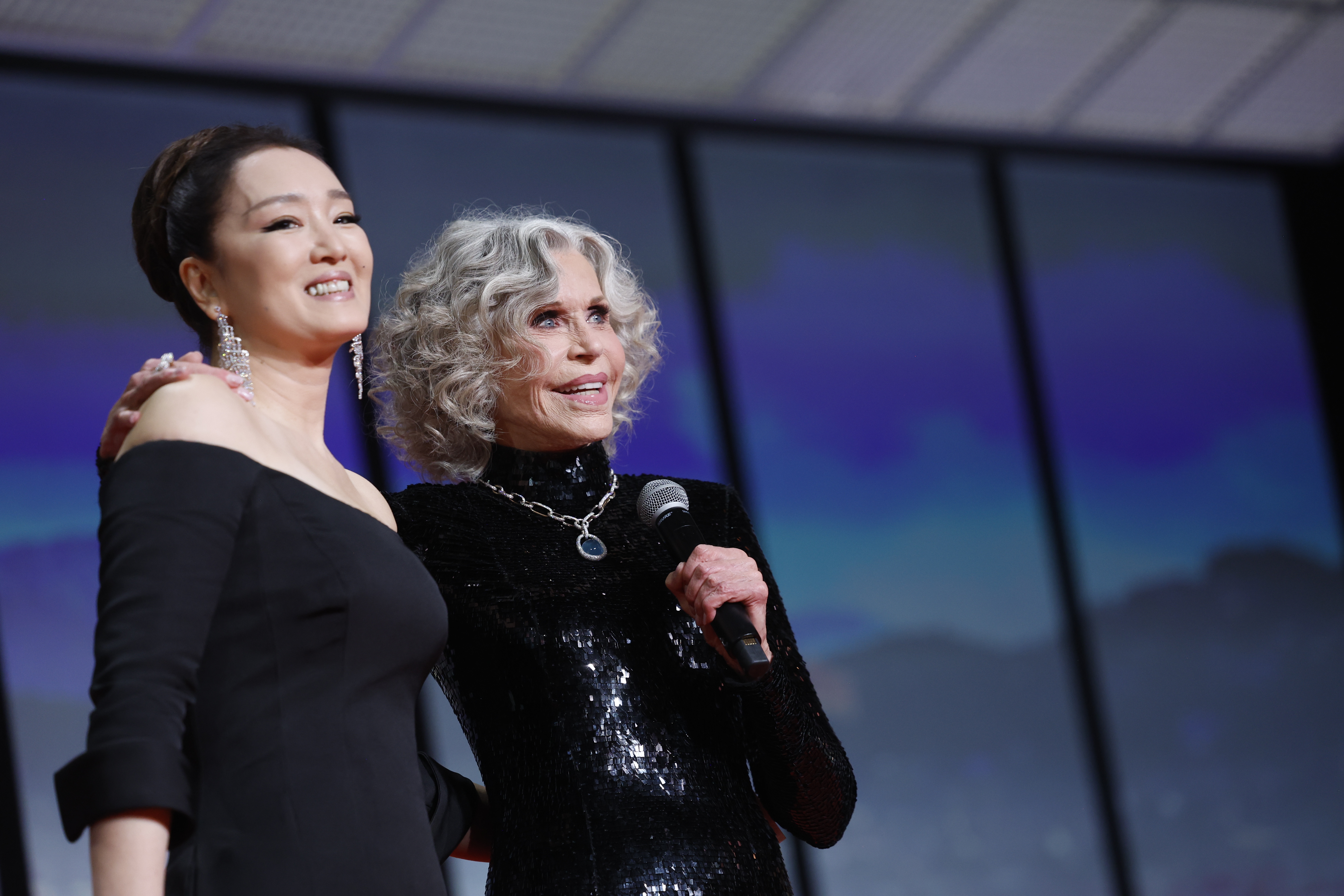 epa12951076 Gong Li (L) and Jane Fonda speak during the opening ceremony of the 79th annual Cannes Film Festival, in Cannes, France, 12 May 2026. The film festival runs from 12 to 23 May 2026.  EPA/SEBASTIEN NOGIER