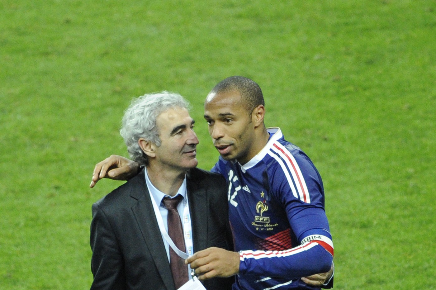 French coach  Raymond Domenech (L) celebrates with French forward Thierry Henry