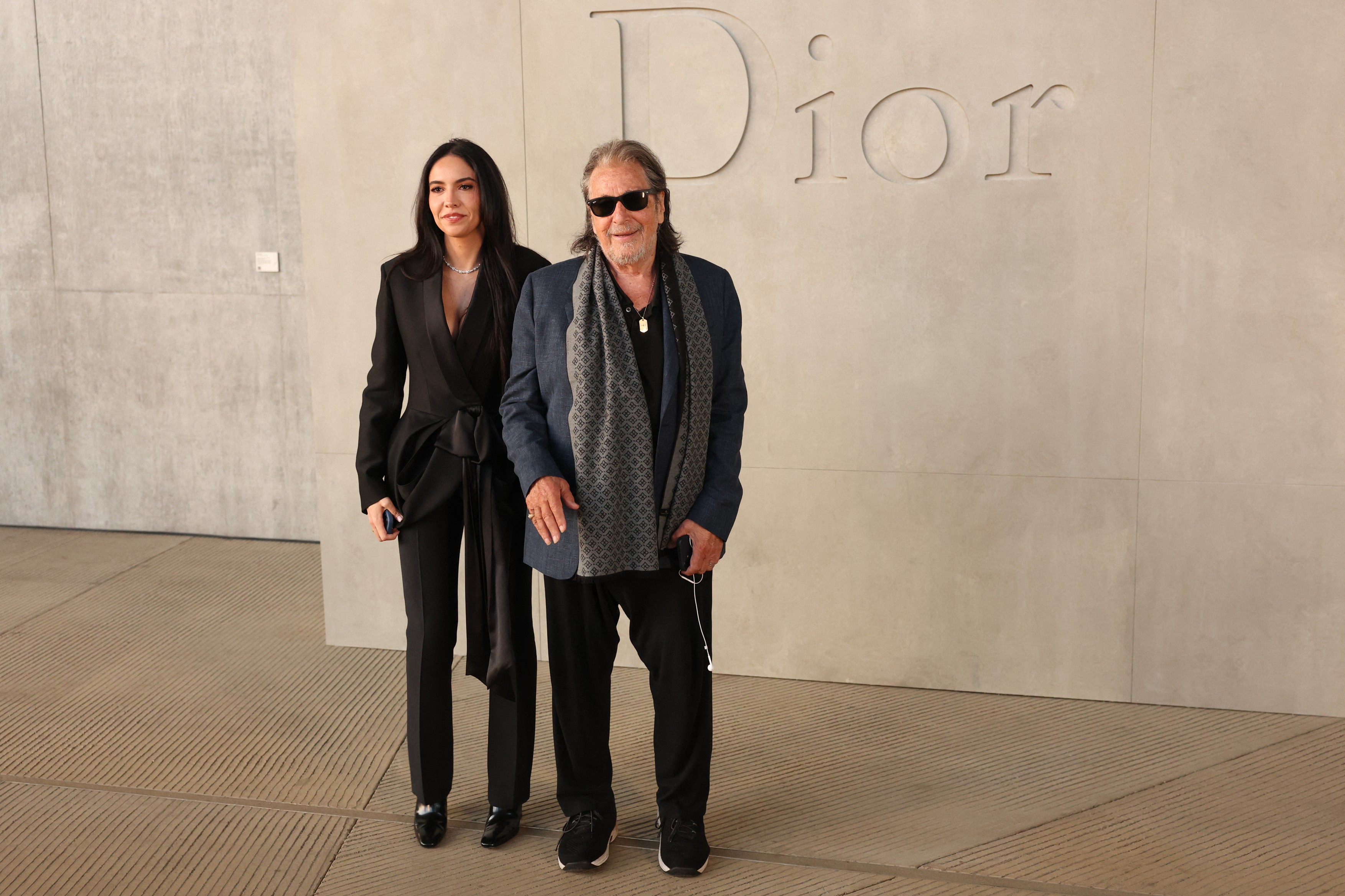 US actor Al Pacino and his partner film producer Noor Alfallah attend the Dior 2027