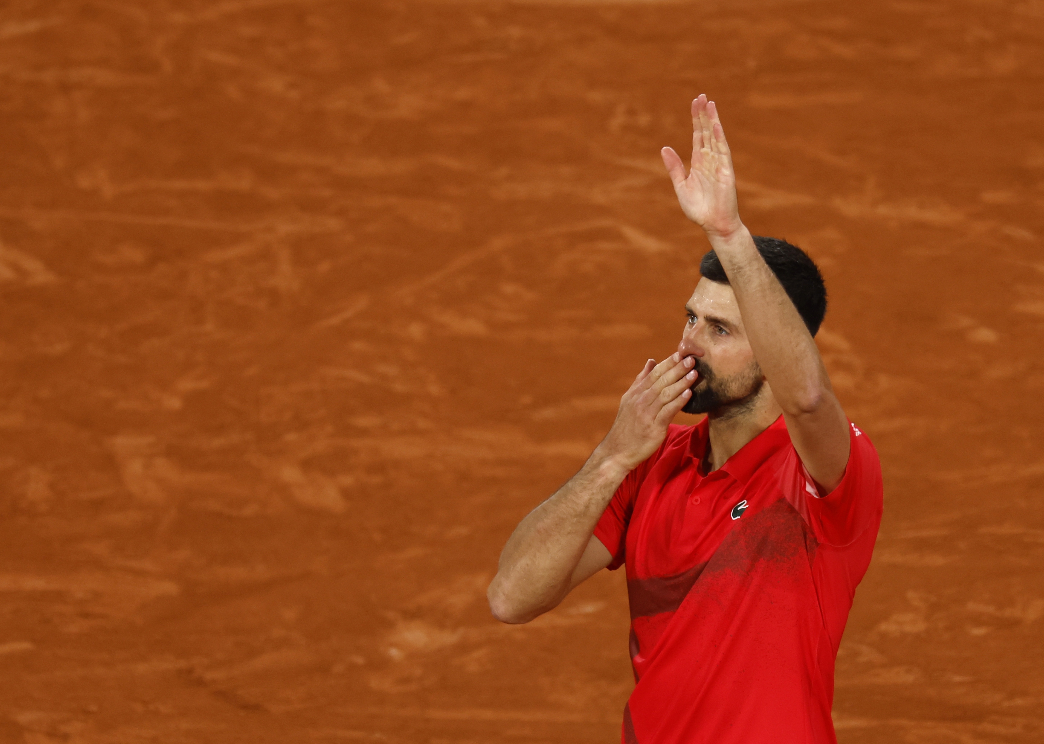 Novak Djokovic of Serbia reacts after losing his Men's semi-finals match against Jannik Sinner of Italy at the French Open Grand Slam tennis tournament at Roland Garros in Paris, France, 06 June 2025.