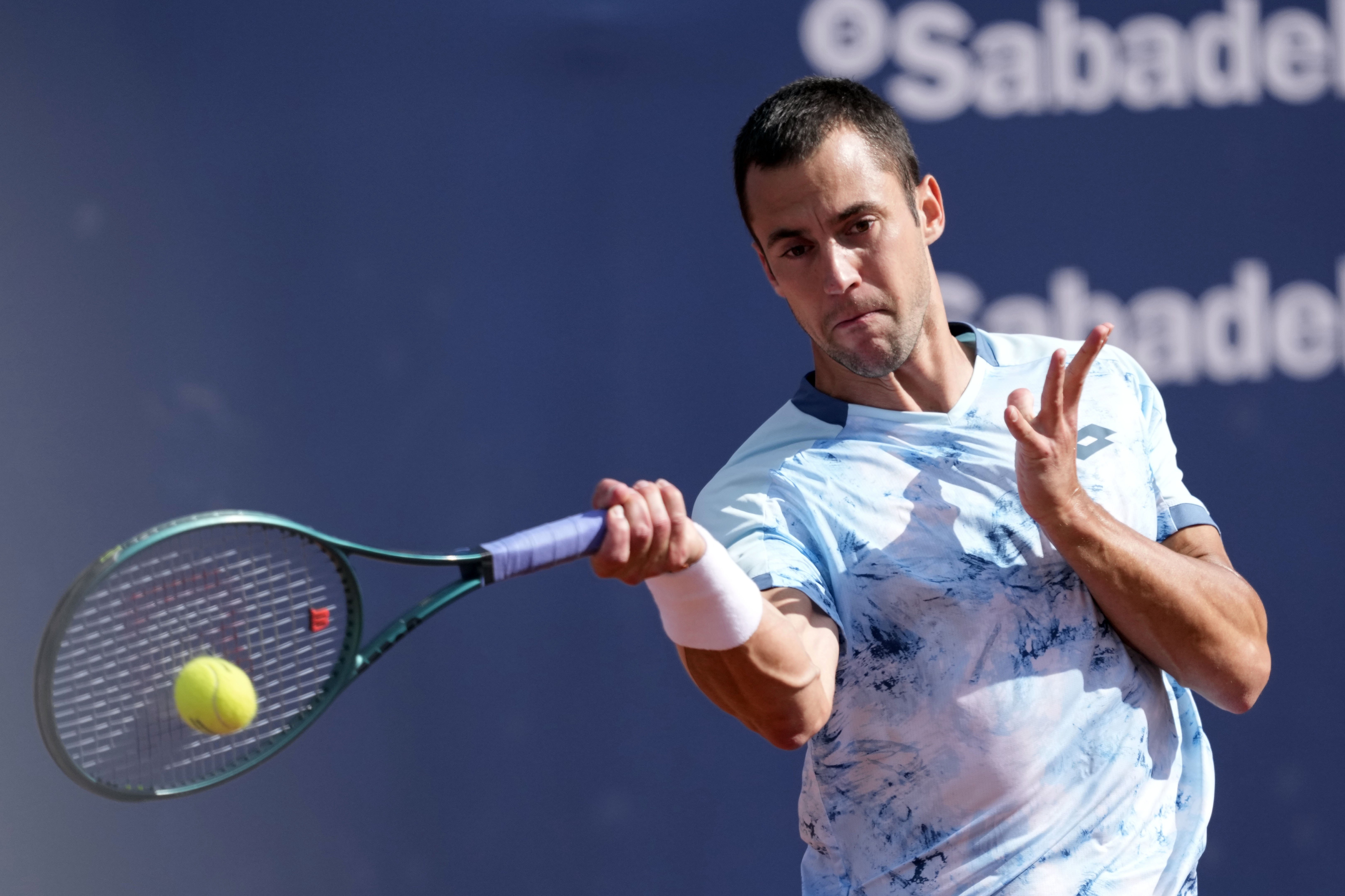 Laslo Djere of Serbia in action