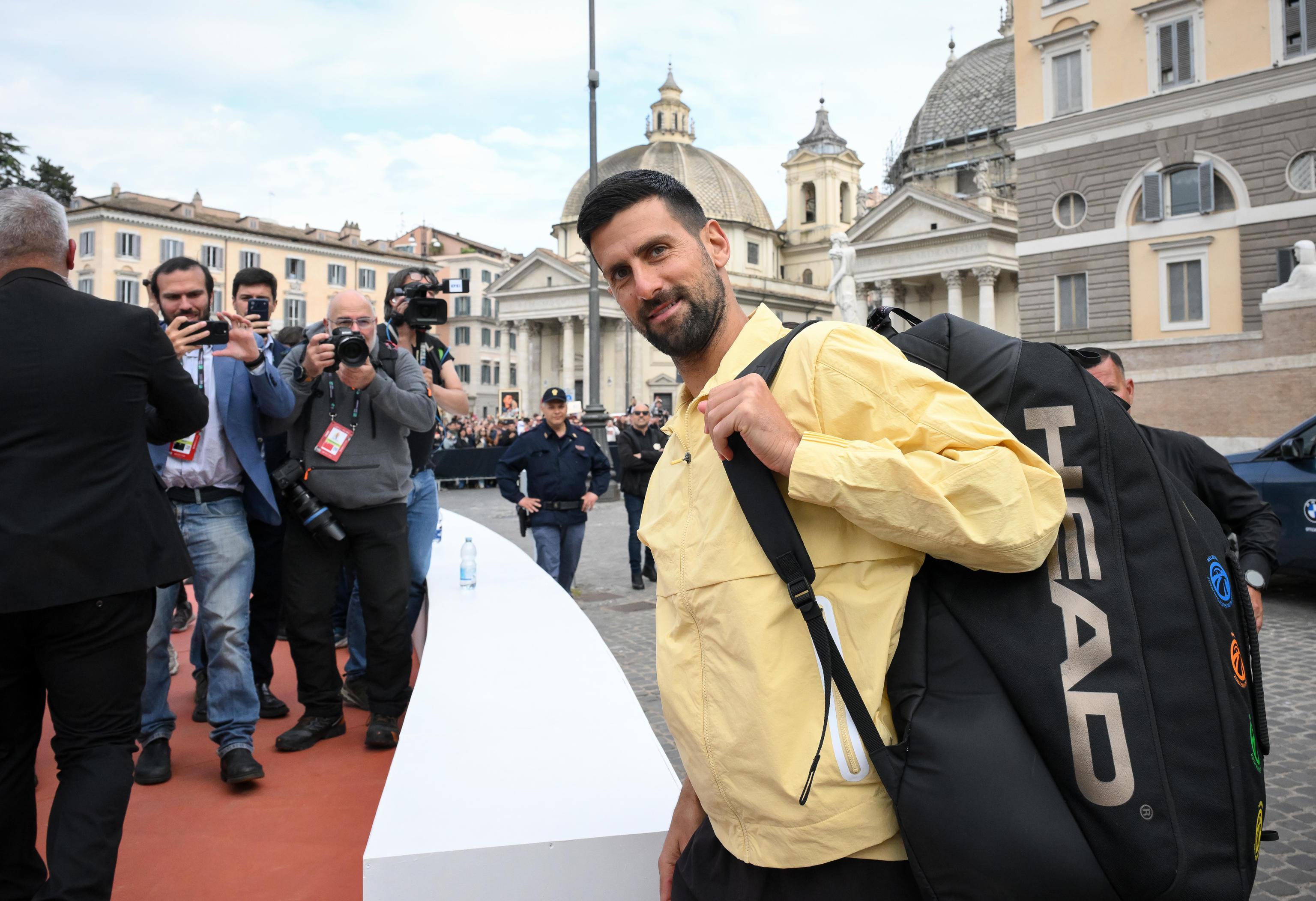 Serbian tennis player Novak Djokovic arrives for a training session that is open to the public on a clay court set up in the Piazza del Popolo in Rome, Italy, 05 May 2026.