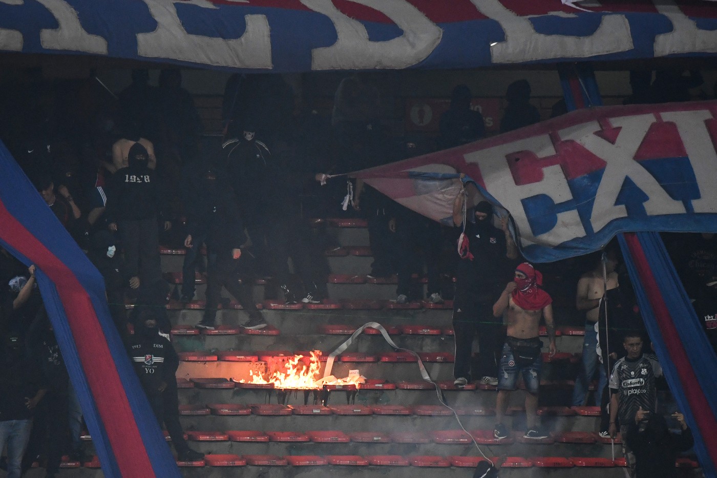 Medellin fans set fire in the stands during the Copa Libertadores group stag