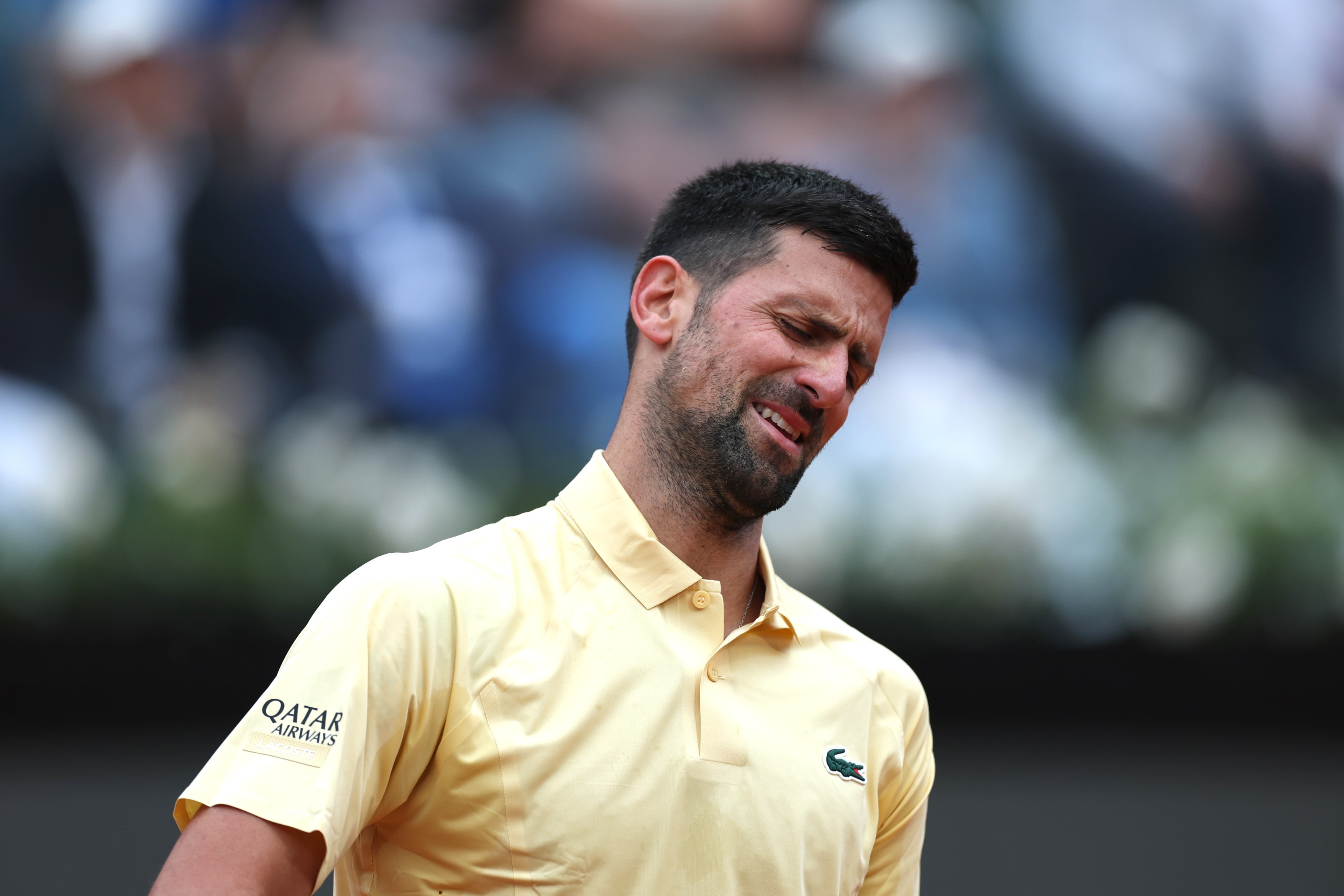 Novak Djokovic of Serbia reacts after losing a point at the ATP Italian Open in Rome