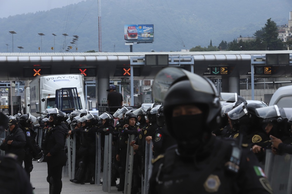 epa13025206 Members of Mexico's Security Secretariat