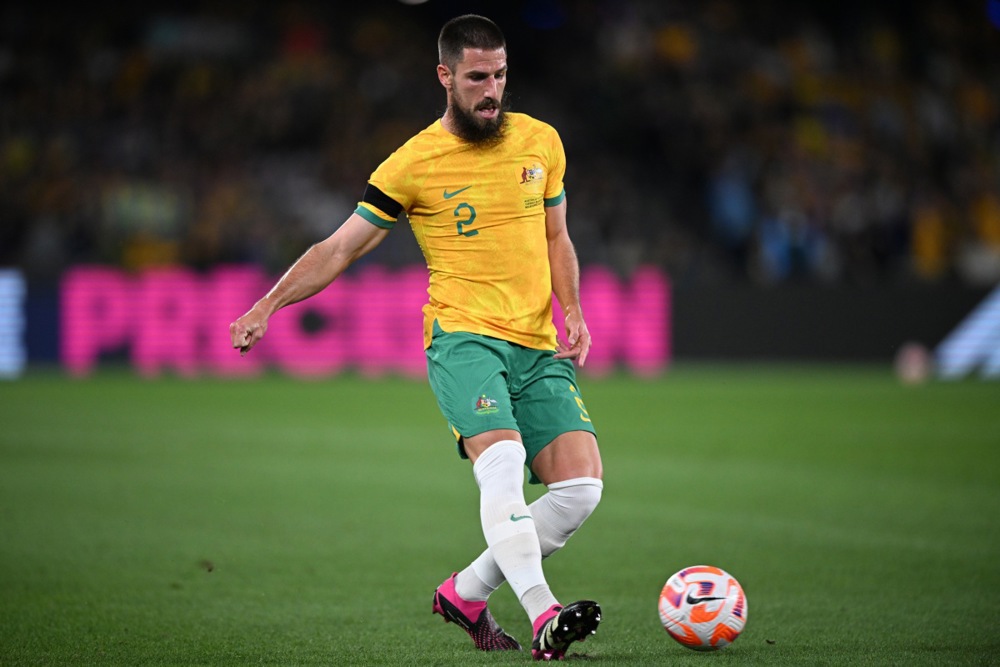 epa10546816 Milos Degenek of Australia kicks the ball